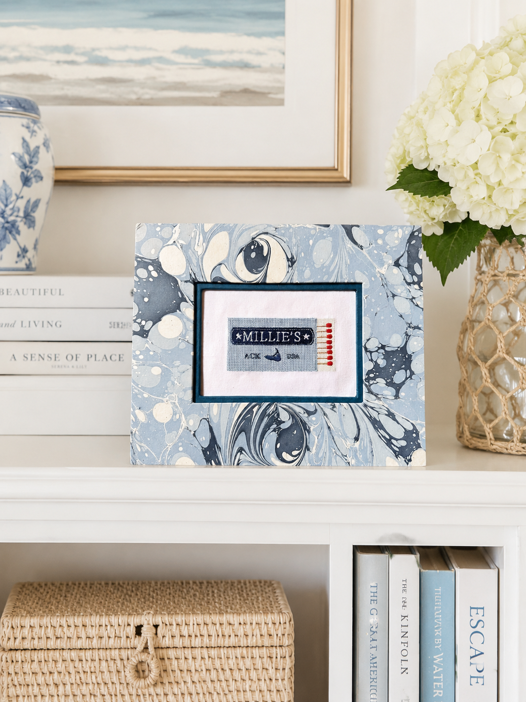 Bayberry Embroidery Millie's Matchbook Styled on Front Table.png