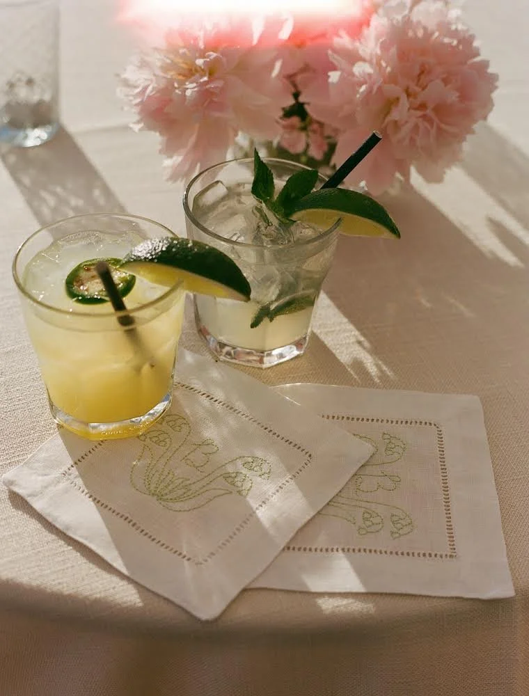 Personalized embroidered cocktail napkins with monogram and lily of the valley.jpg