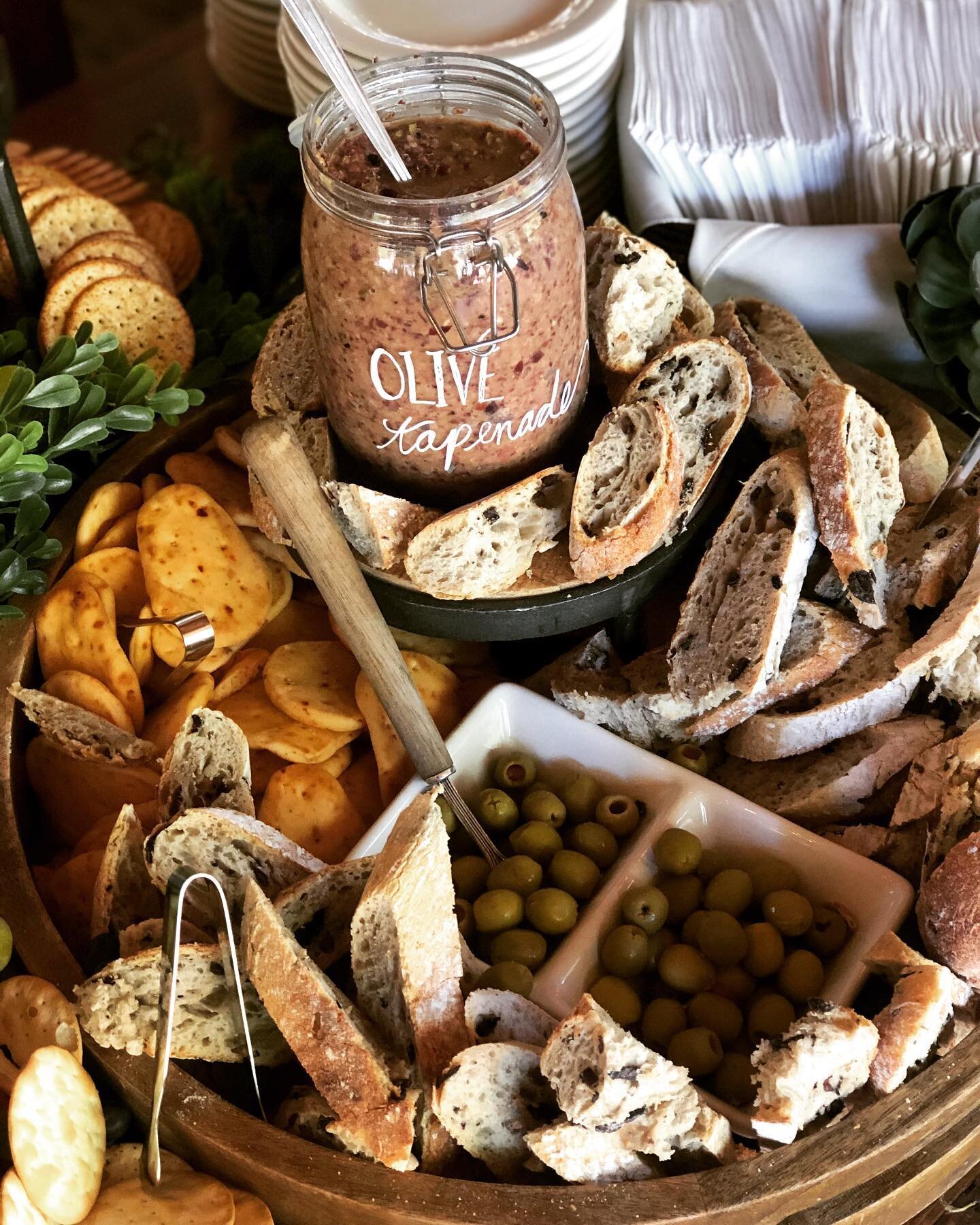 Olive tapenade with warm naan bread, and a delicious warm rosemary kalamata olive bread, one of many options for your #charcuterie board!  #foxinthewoodscatering  #sanmoritzlodge #sanmoritzweddings #lakearrowheadcatering #weddingcatering