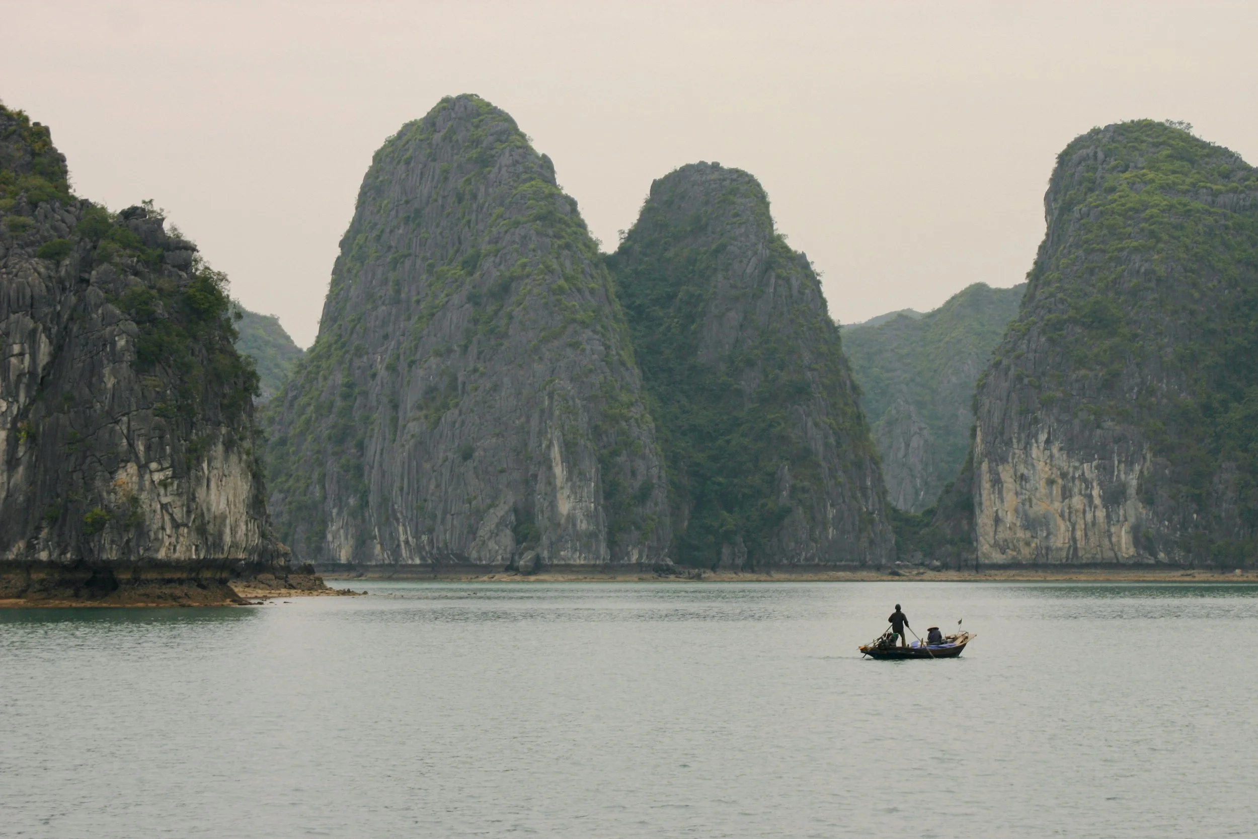 Fisherman in the bay - Ha Long Bay, Vietnam