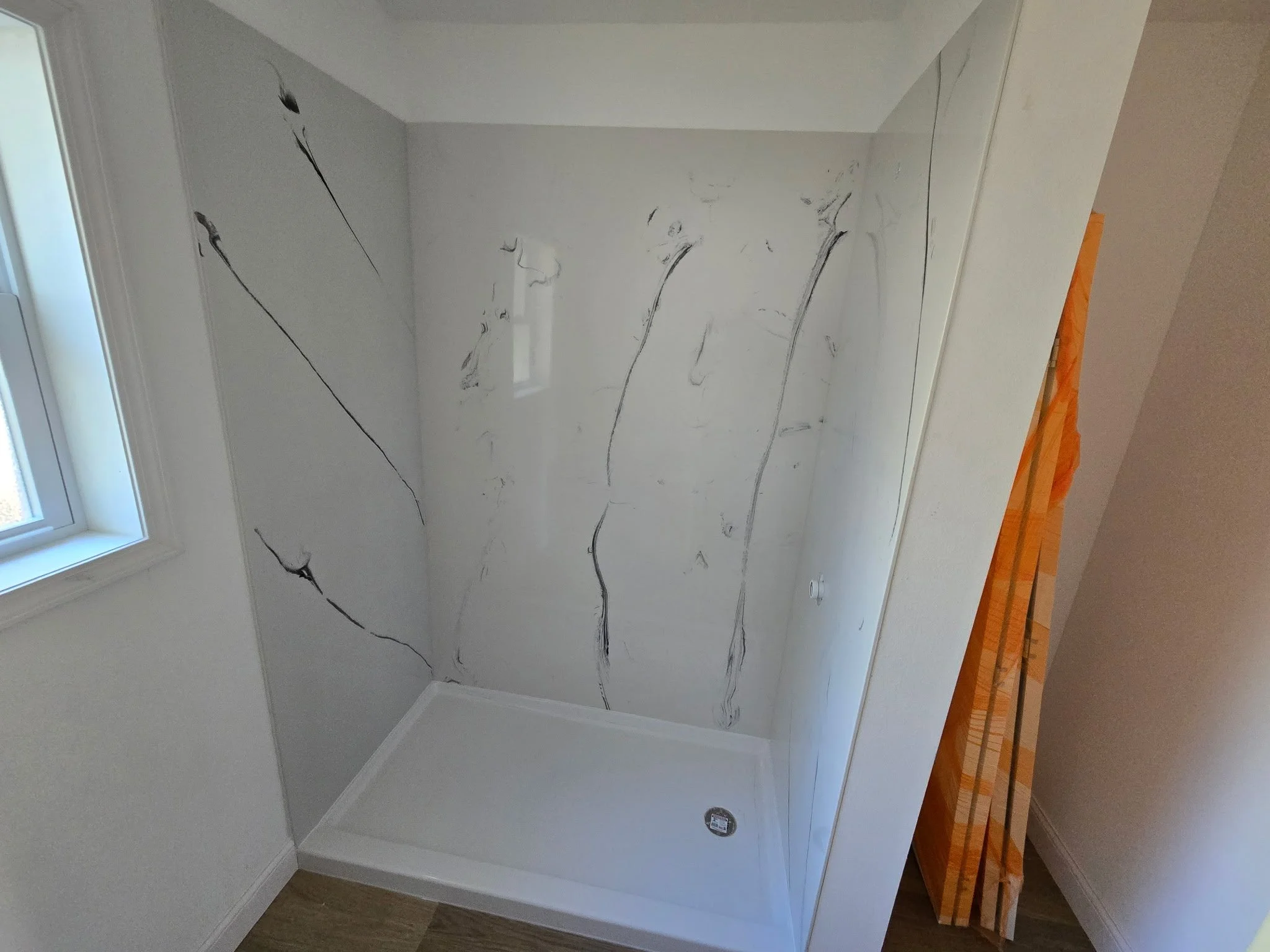 Black on White walk-in shower