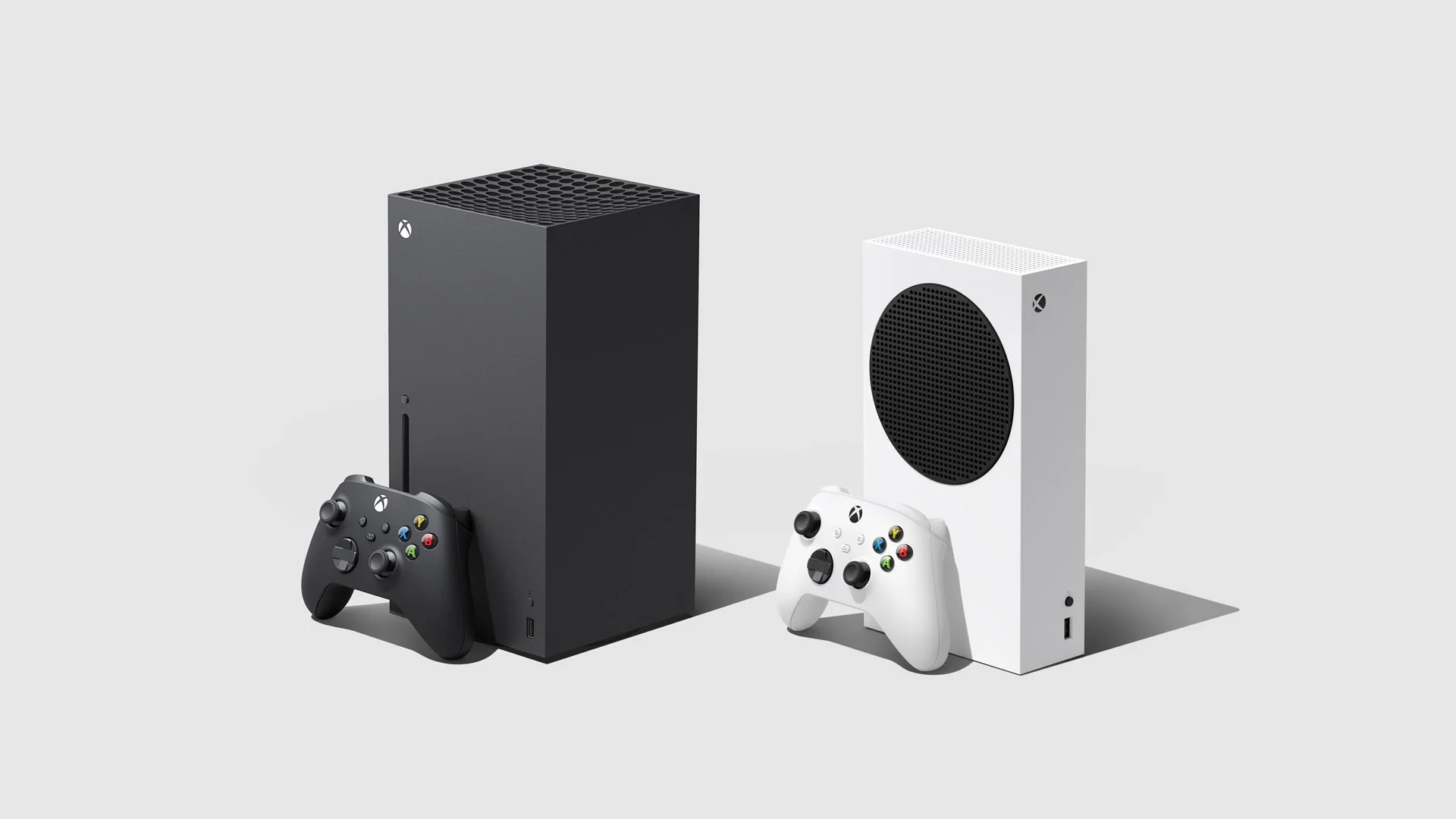 Side by side image of the black Xbox Series X and the white Xbox Series S each with a matching Xbox controller