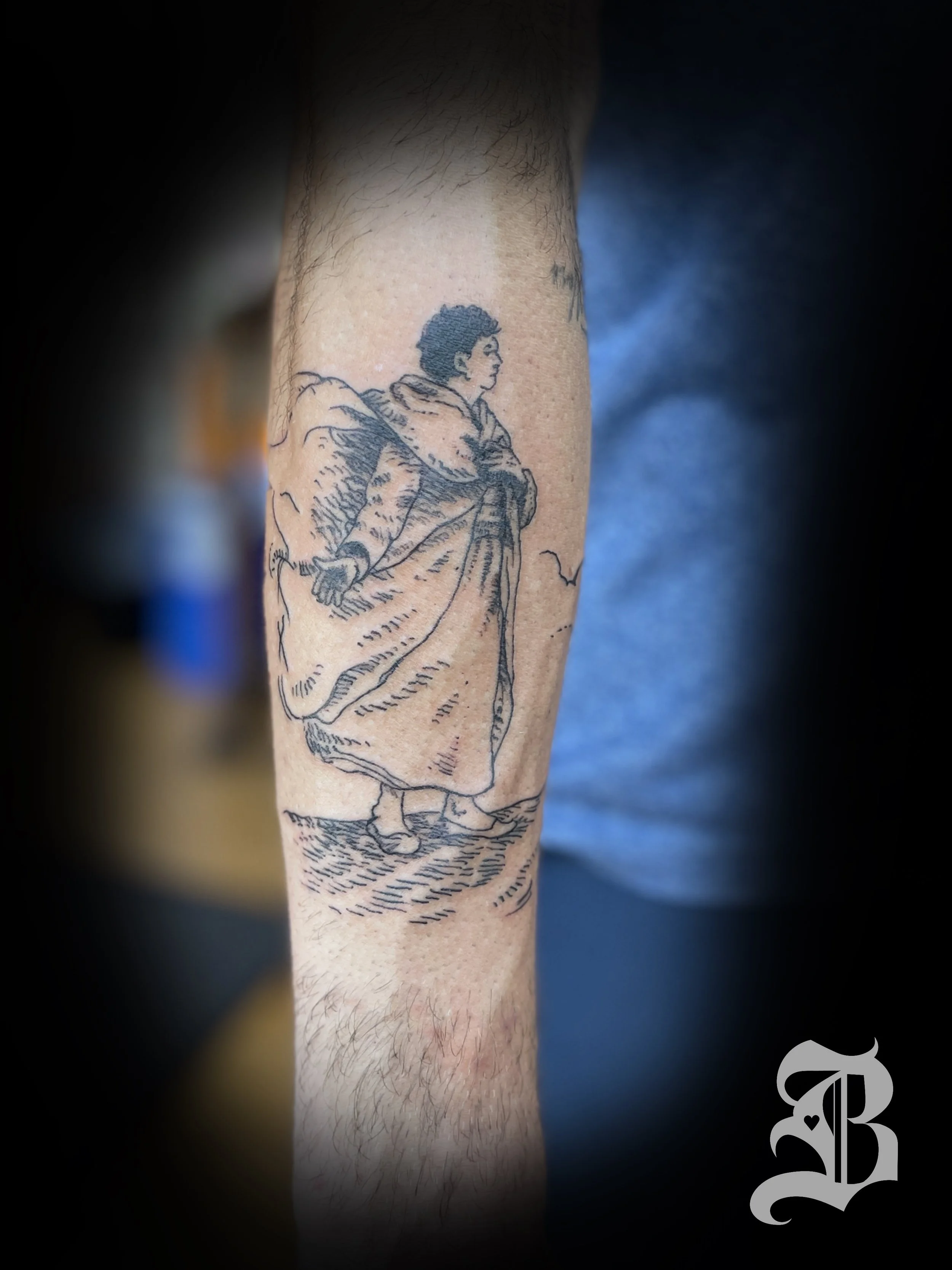 The Alchemist book illustration black and gray arm tattoo Boston Massachusetts 