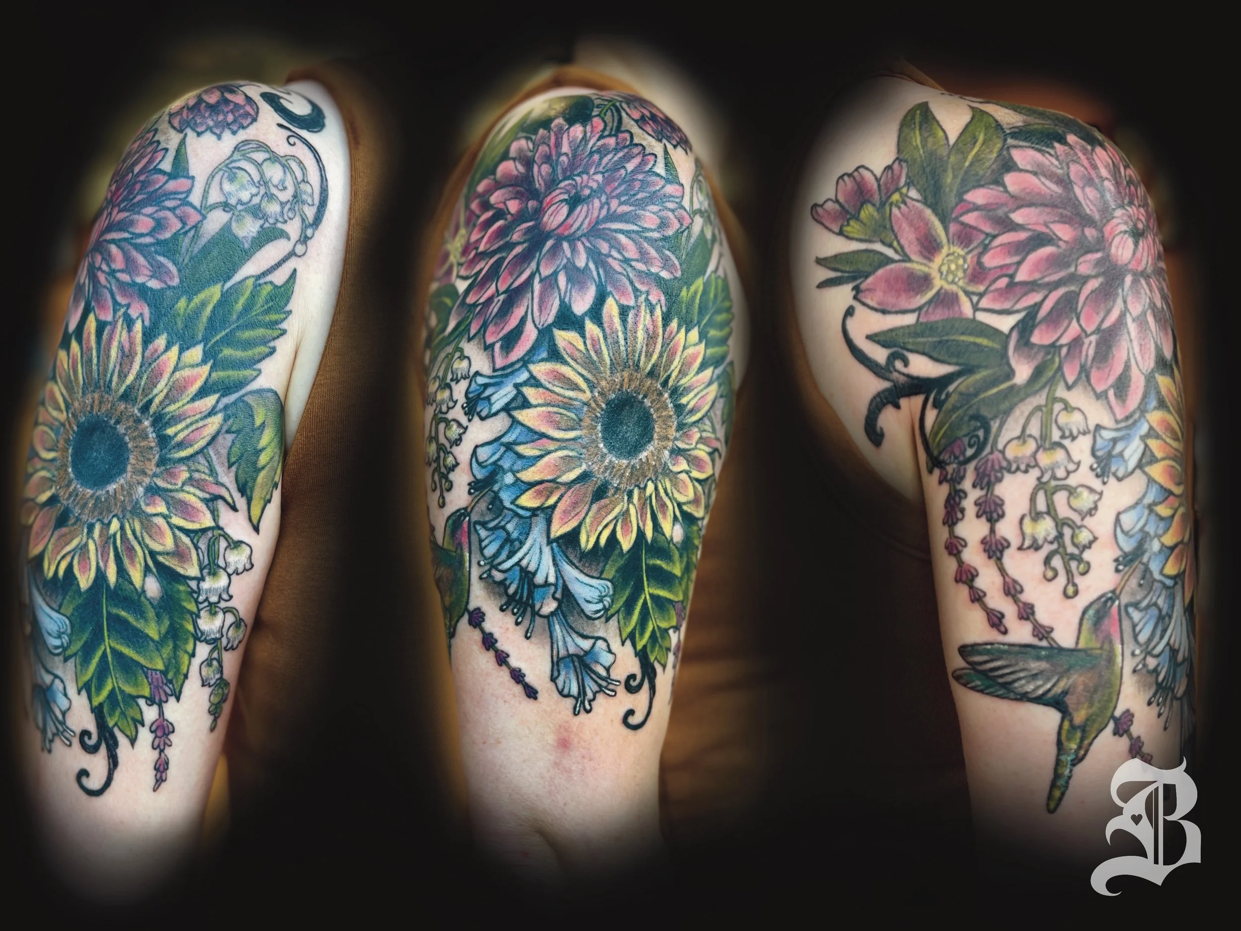 Full-color floral half arm sleeve with hummingbird.