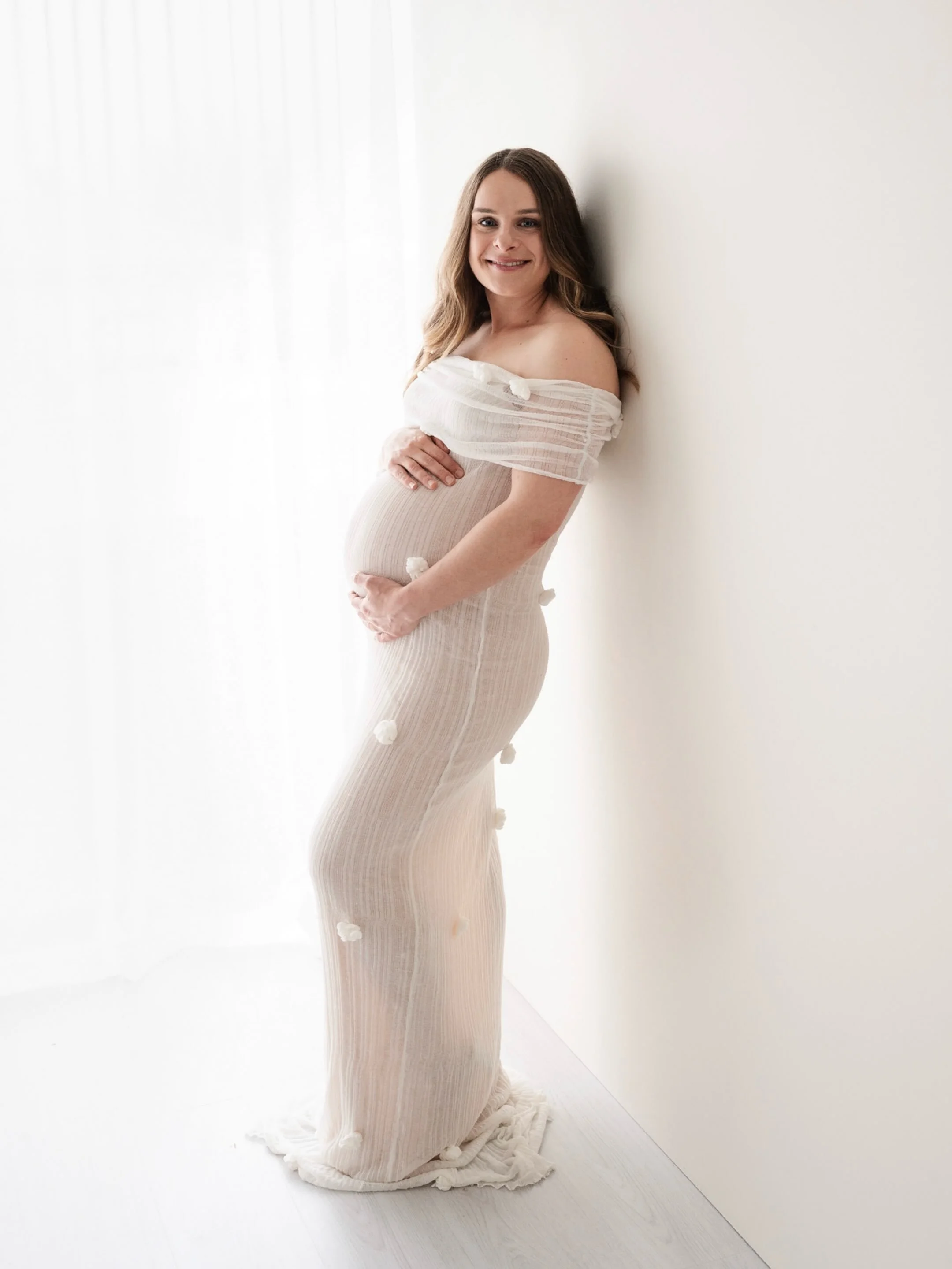 Can we take a moment for this beautiful maternity session in studio?! 🥹 Just Mum &amp; Dad in that lingering moment before their world changes. Such a special moment in time, a rainy day that was just perfect for indoor snuggles.