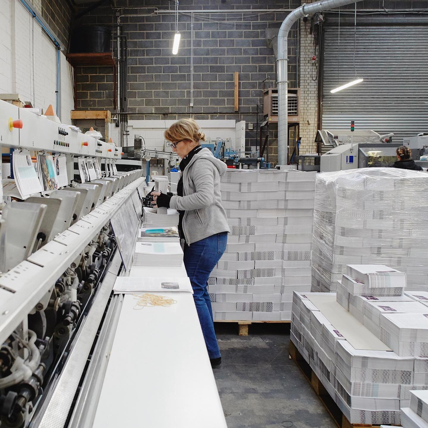 Making books at Empress Litho in Woolwich. The 24-strong team typically process around 2.5 million sheets per month, and their capability includes producing stapled, perfect-bound or sewn soft- and hardback books in all shapes and sizes. The image is