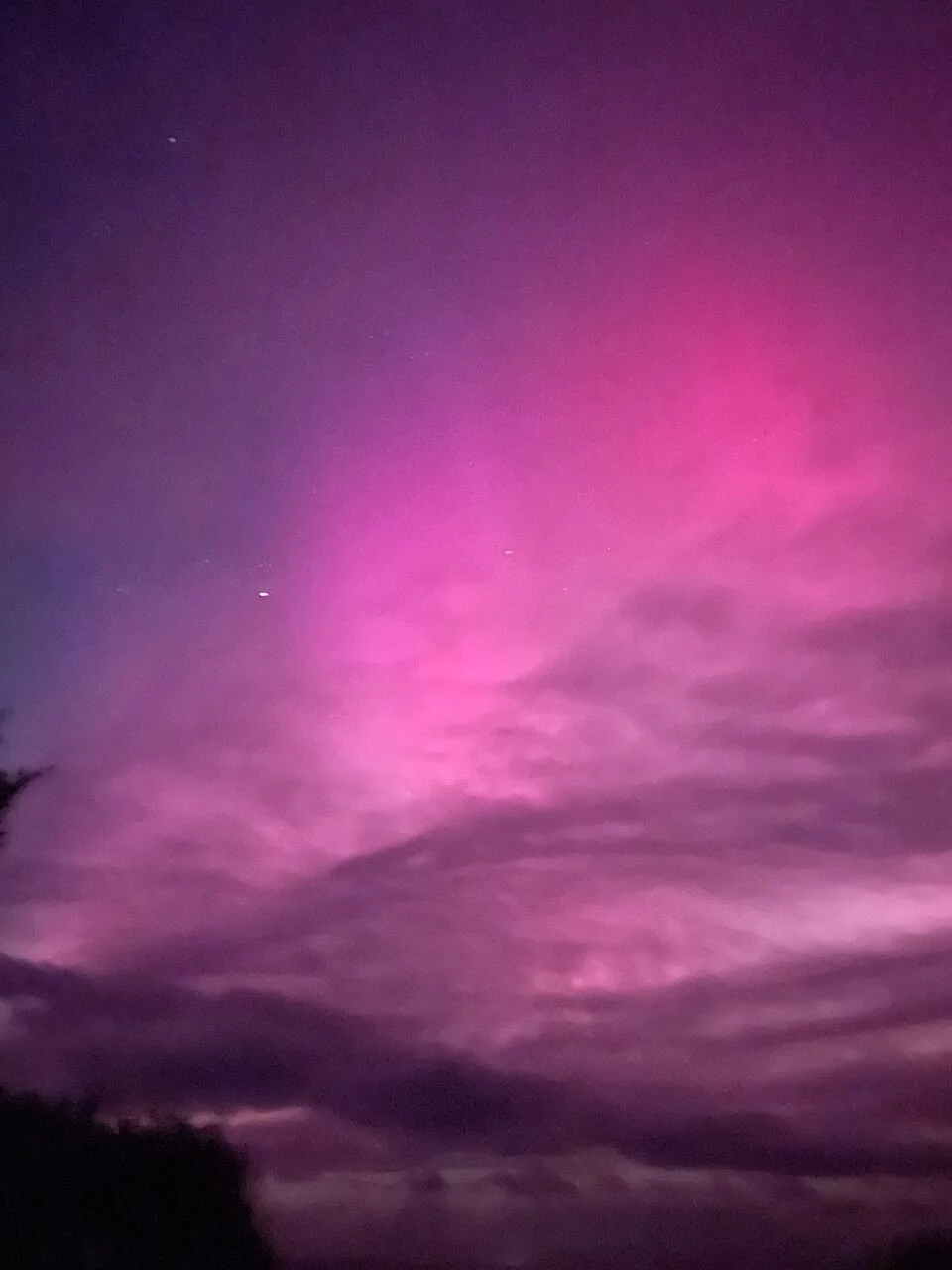 Pink Northern Lights viewed from Wreck Cottage