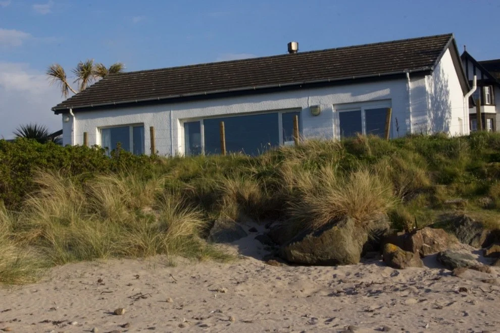 View of Wreck Cottage from the beach.