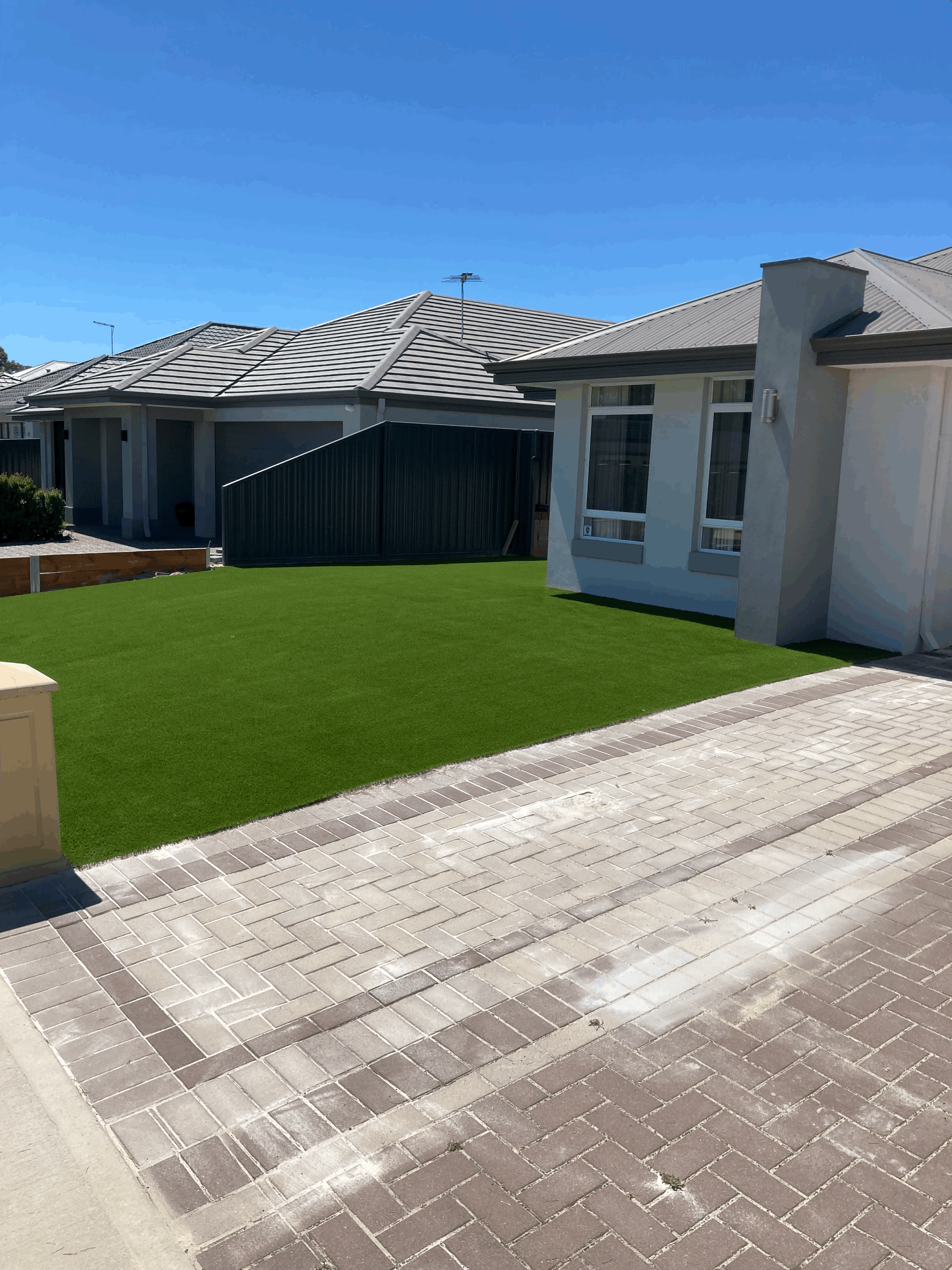 synthetic grass and paving