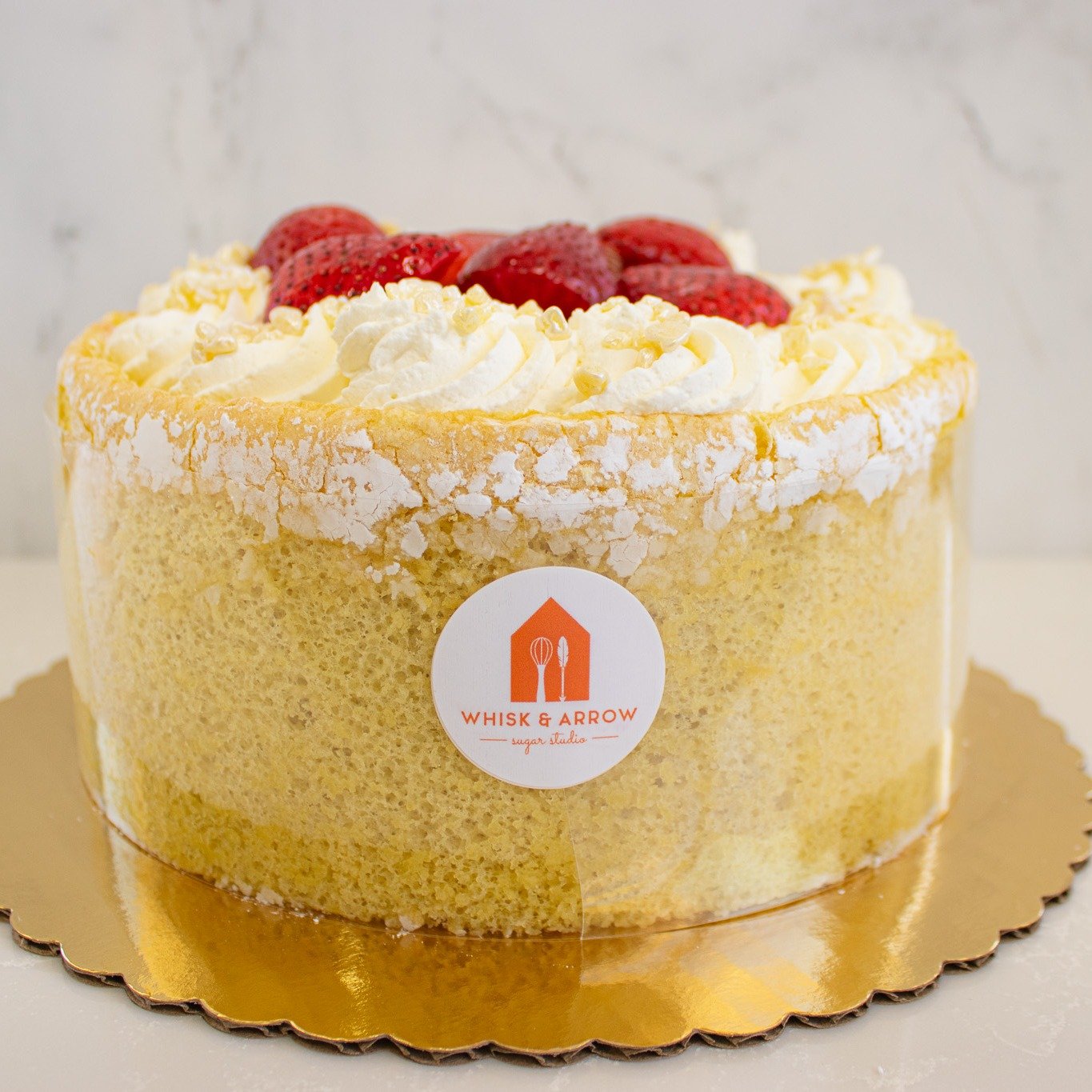 Strawberries and sunshine go hand in hand. We have an extra of our Cake of the Month, a Charlotte Russe, available today!

The Charlotte Russe is strawberry bavarois wrapped in lady finger sponge and garnished with chantilly cream and fresh strawberr