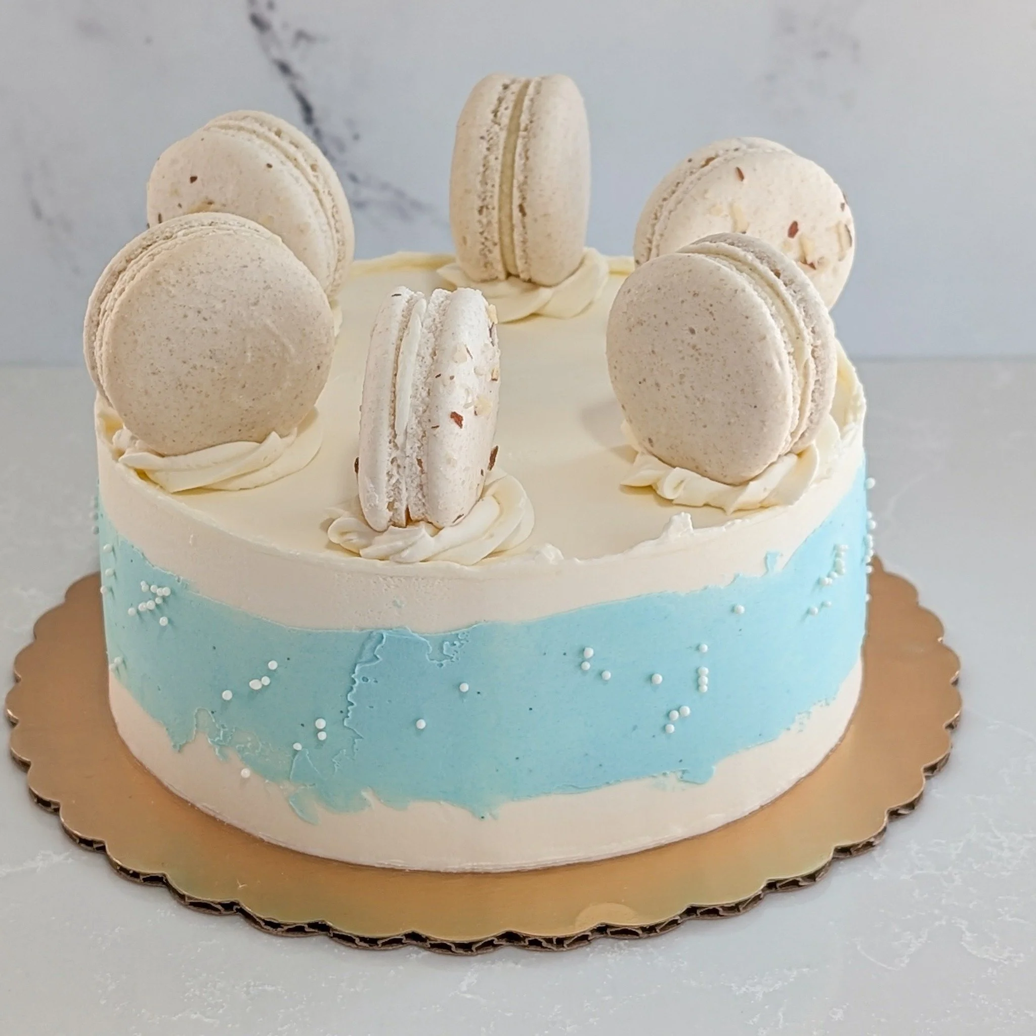 If you want your cake to be simple, but still stand out, consider adding a dash of color to the outside of your cake! Sprinkles always help too. 
.
To order your own custom cake:
Email us here: info@whiskandarrow.com
or call us: 920-815-3645
.
-Cake 