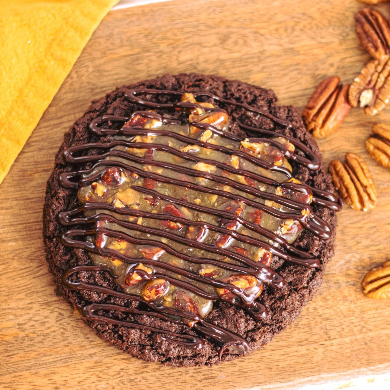 *Menu Below*
New, &amp; revised cookies!  The Turtle Cookie is back and revised. You know that pecan &lsquo;goop&rsquo; (affectionate) from cupcake day  that we can&rsquo;t stop talking about. The Turtle cookie now has that! THE GOOP! The Bourbon Old