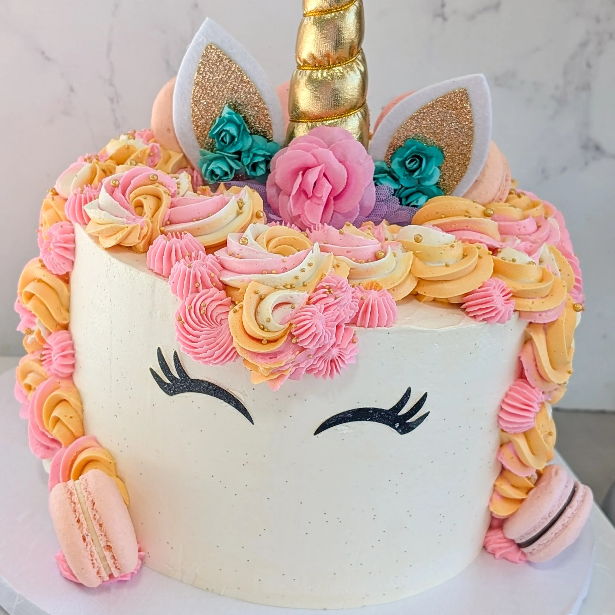 These unicorn cakes are just too sweet, perfect for a magical birthday.
.
To order your own custom cake:
Email us here: info@whiskandarrow.com
or call us: 920-815-3645
.
-Cake details-
Size: 8-inch premium
Add-ons: pink and orange buttercream mane + 