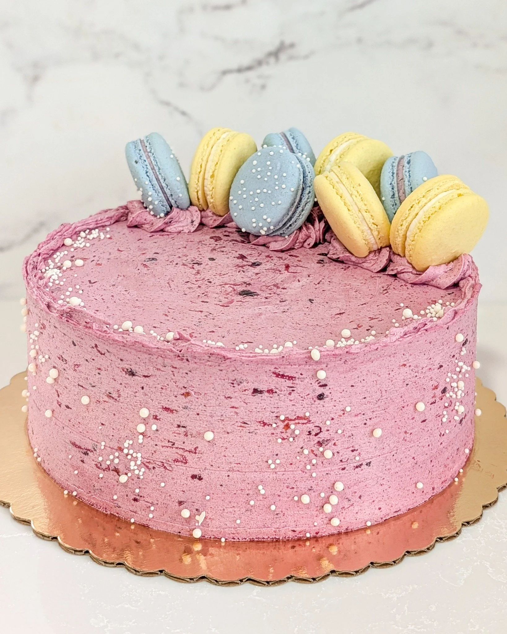 A blueberry lemon fantasy! Do we have any fans of this tasty combo? 
.
To order your own custom cake:
Email us here: info@whiskandarrow.com
or call us: 920-815-3645
.
-Cake details-
Size: 8-inch shorty
Add-ons: Blueberry lemon buttercream + sprinkles