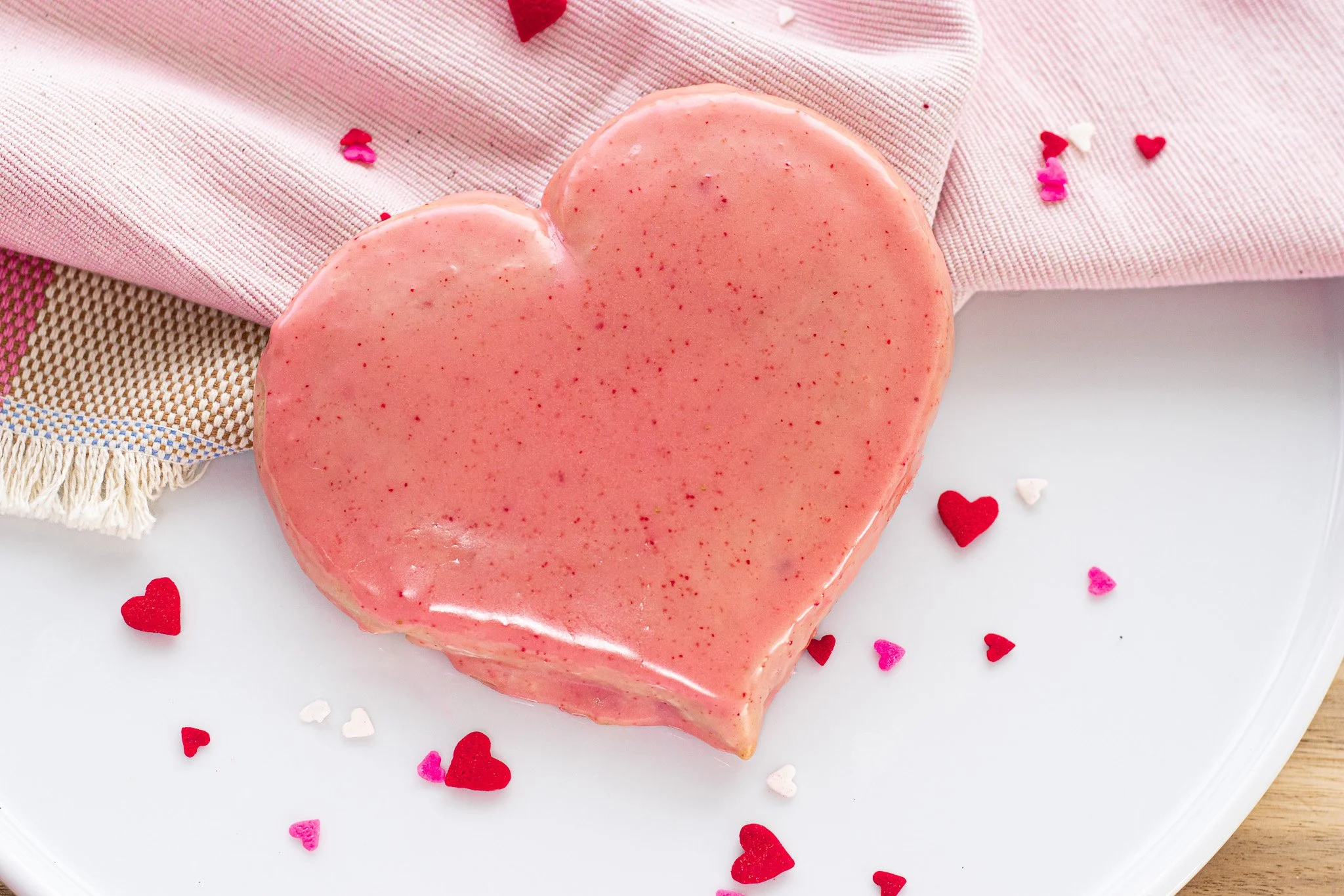 Even if you aren't a fan of Valentines day, you can enjoy this cookie! This has a strawberry sugar cookie with bits of freeze dried strawberries inside and a strawberry glaze enveloping the top of the cookie. 🍓
.
Stop in or order online thru our app