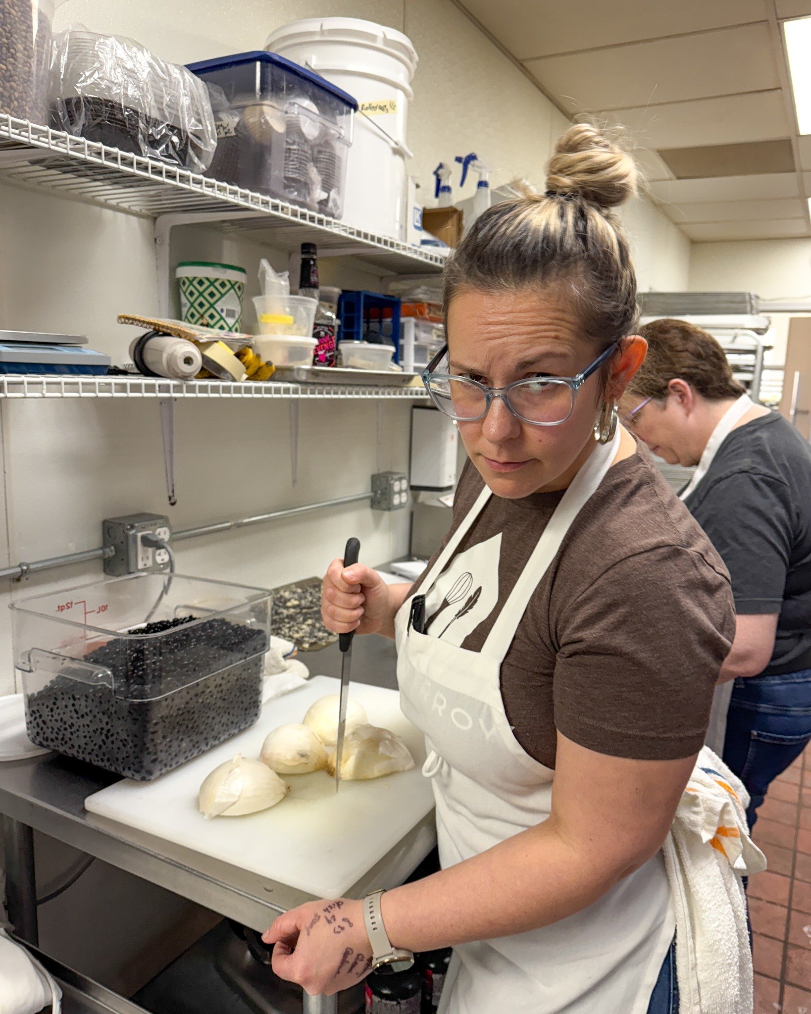 What is Chef Nea cooking up with black beans and onions???? 
.
Stop in or order online thru our app for pickup or delivery! Located in Appleton, Wisconsin. 
.
#whiskandarrow #appletonwi  #wisconsinbakery #localbusiness #beans
