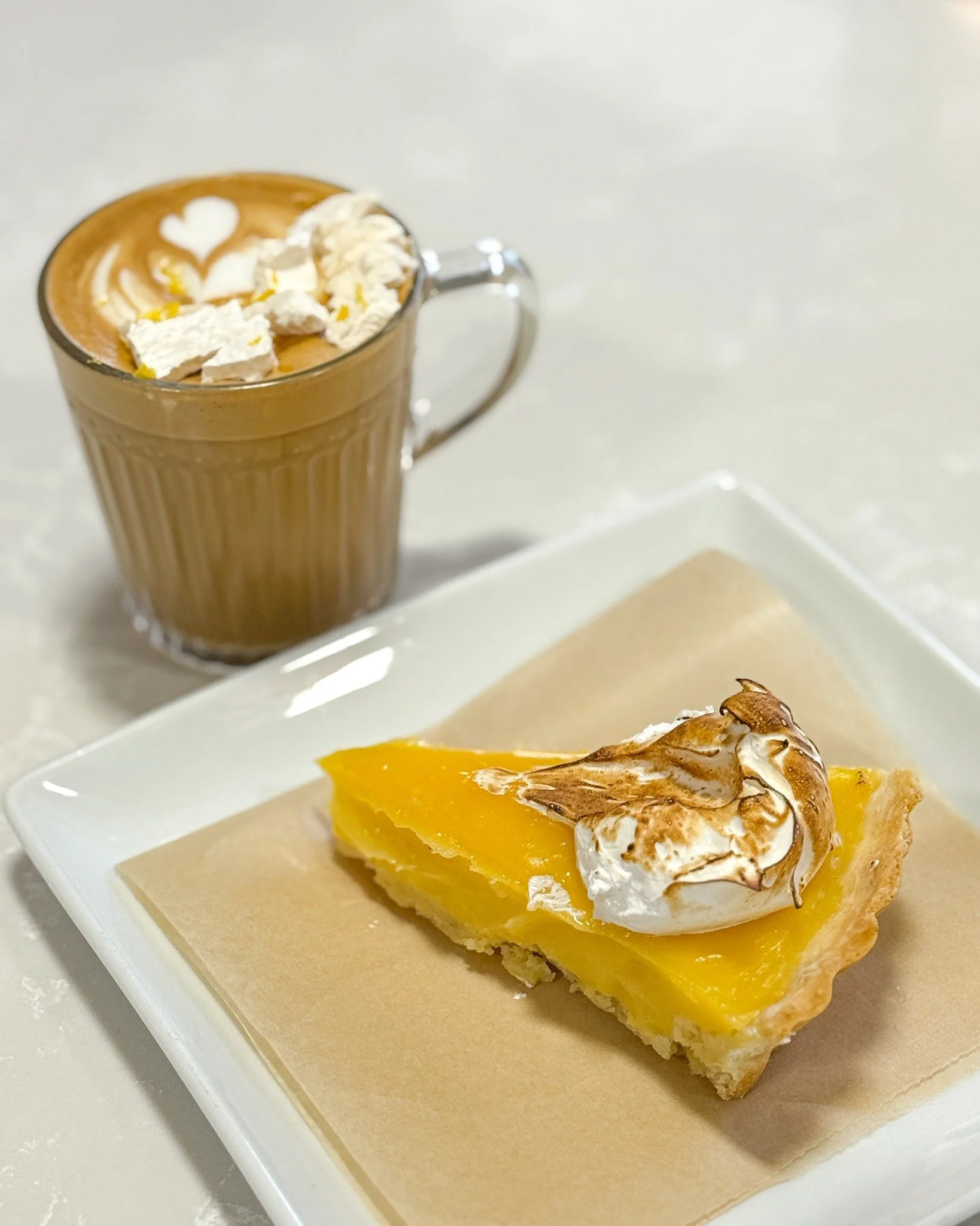 Double up on your Lemon Meringue with a tart and a latte! Yum. 
.
Stop in or order online thru our app for pickup or delivery! Located in Appleton, Wisconsin. 
.
#whiskandarrow #appletonwi  #wisconsinbakery #localbusiness #lemonmeringue