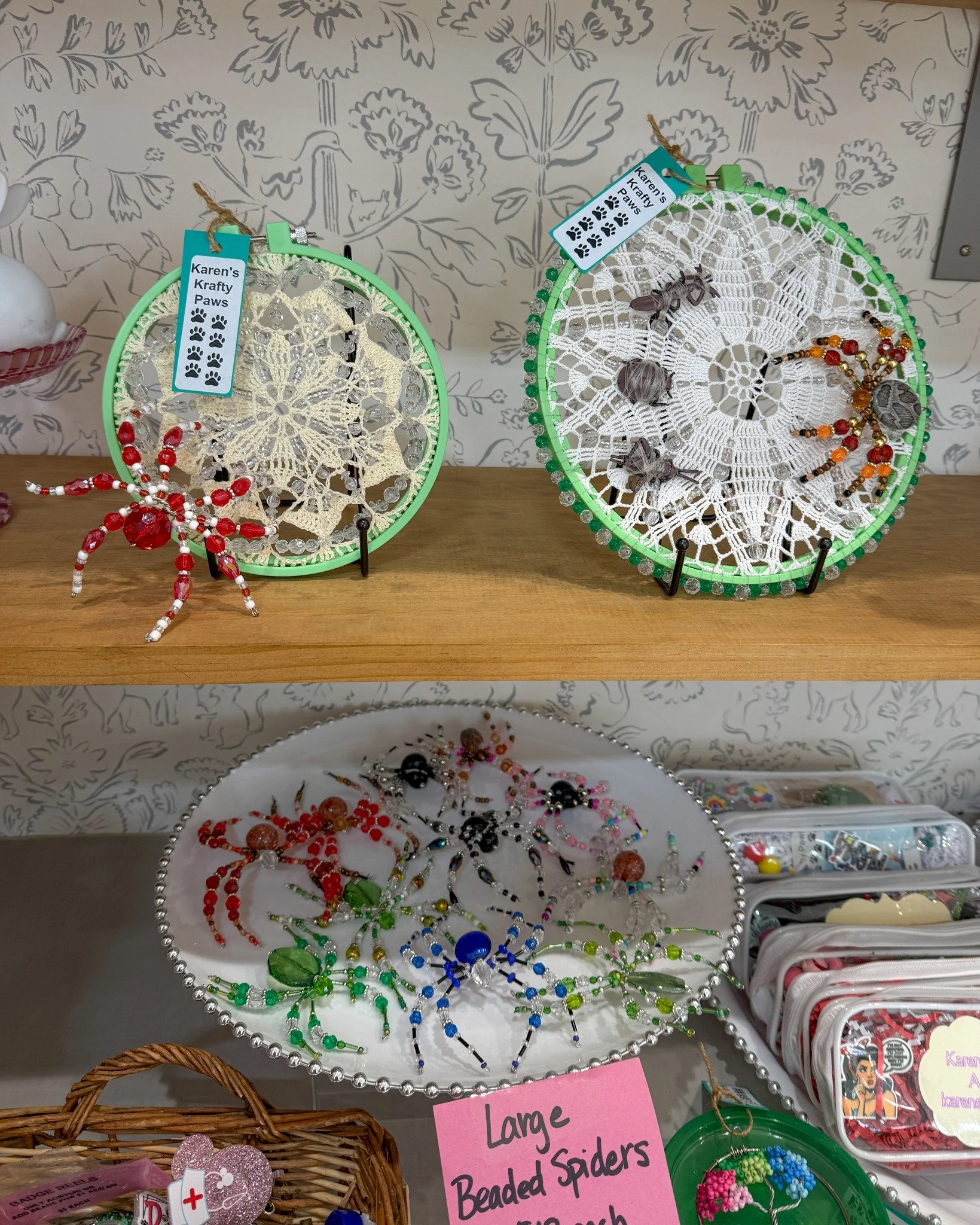 Make sure to check out @karenskraftypaws  while you're visiting us at the shop! I love the beaded spiders so much, the doilies as webs is so smart. There are also cute little gifts that you could include in an Easter Basket! 
.
Stop in or order onlin