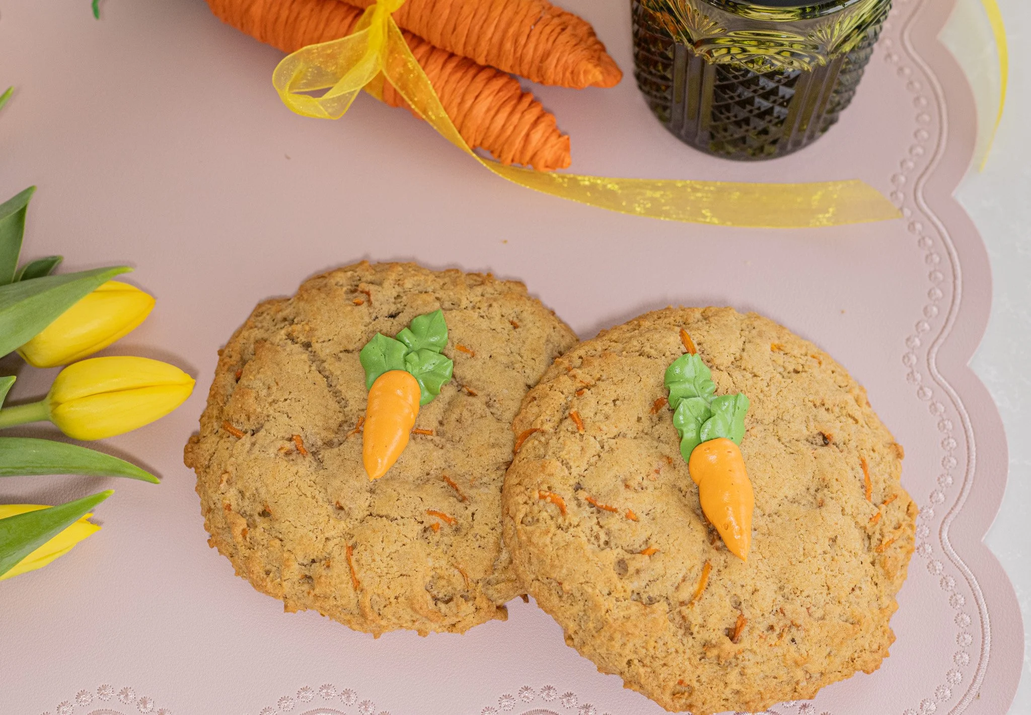 Our Stuffed Carrot Cake Cookie is a dream! This cookie has no nuts, or raisins. I love the little buttercream carrot on top, and my favorite part is the cream cheese buttercream on the inside... 
.
#whiskandarrow #appletonwi  #wisconsinbakery #cookie