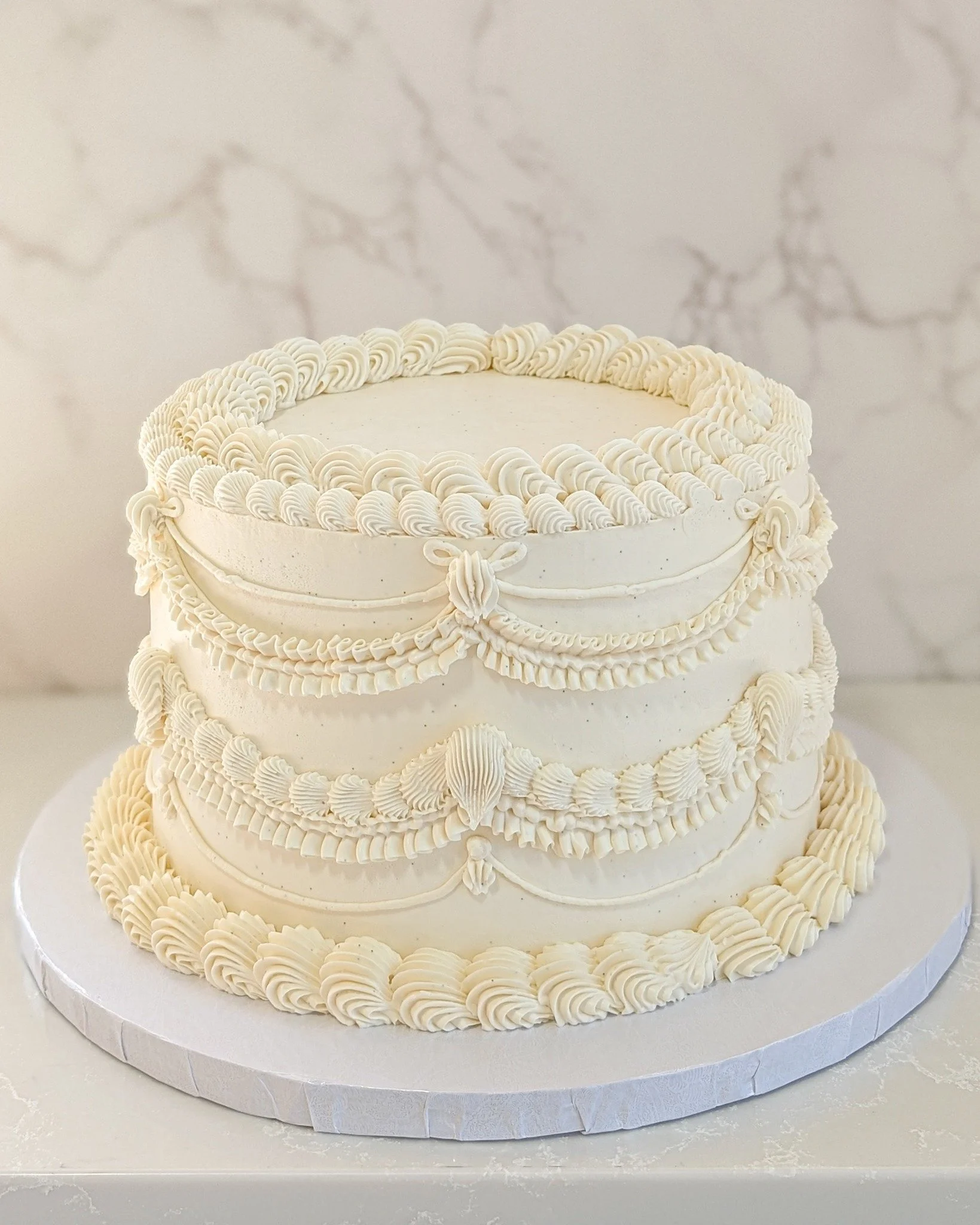 Look at this beautiful buttercream work. I love a colorful cake but this looks incredible, look at all of the details. 
.
Call or email us to book your orders! info@whiskandarrow.com 920-815-3645
.
Stop in or order online thru our app for pickup or d