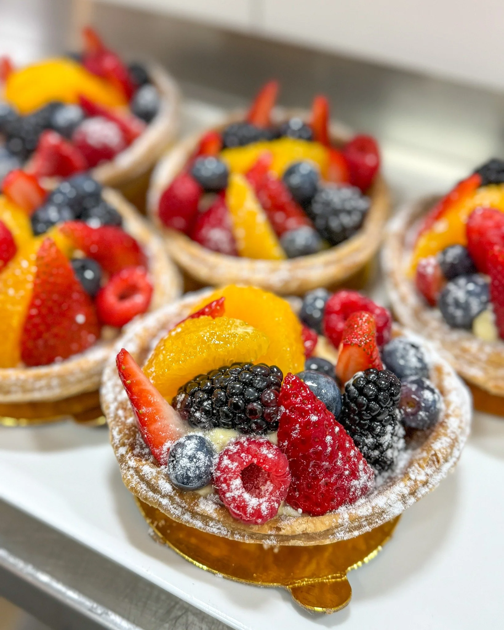 It's Fruit Tart weather! This means you have to get a Fruit Tart, I don't make the rules. Lucky for you we have them at the shop so you don't have to make your own. 
.
Stop in or order online thru our app for pickup or delivery! Located in Appleton, 