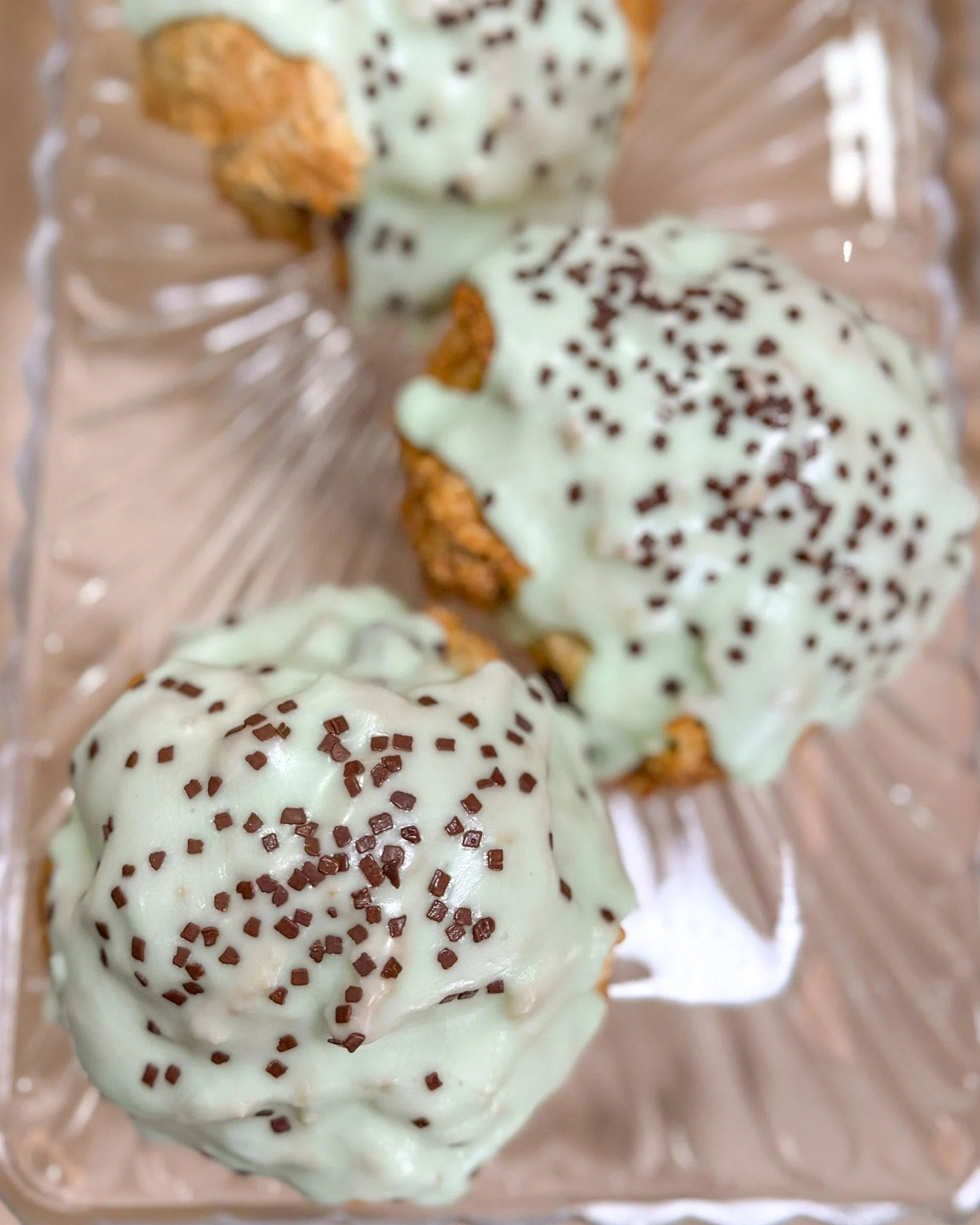 We have some Mint Chip Scones today! These look amazing, I might have to get one myself... 
.
Stop in or order online thru our app for pickup or delivery! Located in Appleton, Wisconsin. 
.
#mintchip #scones #madefromscratch #bakery