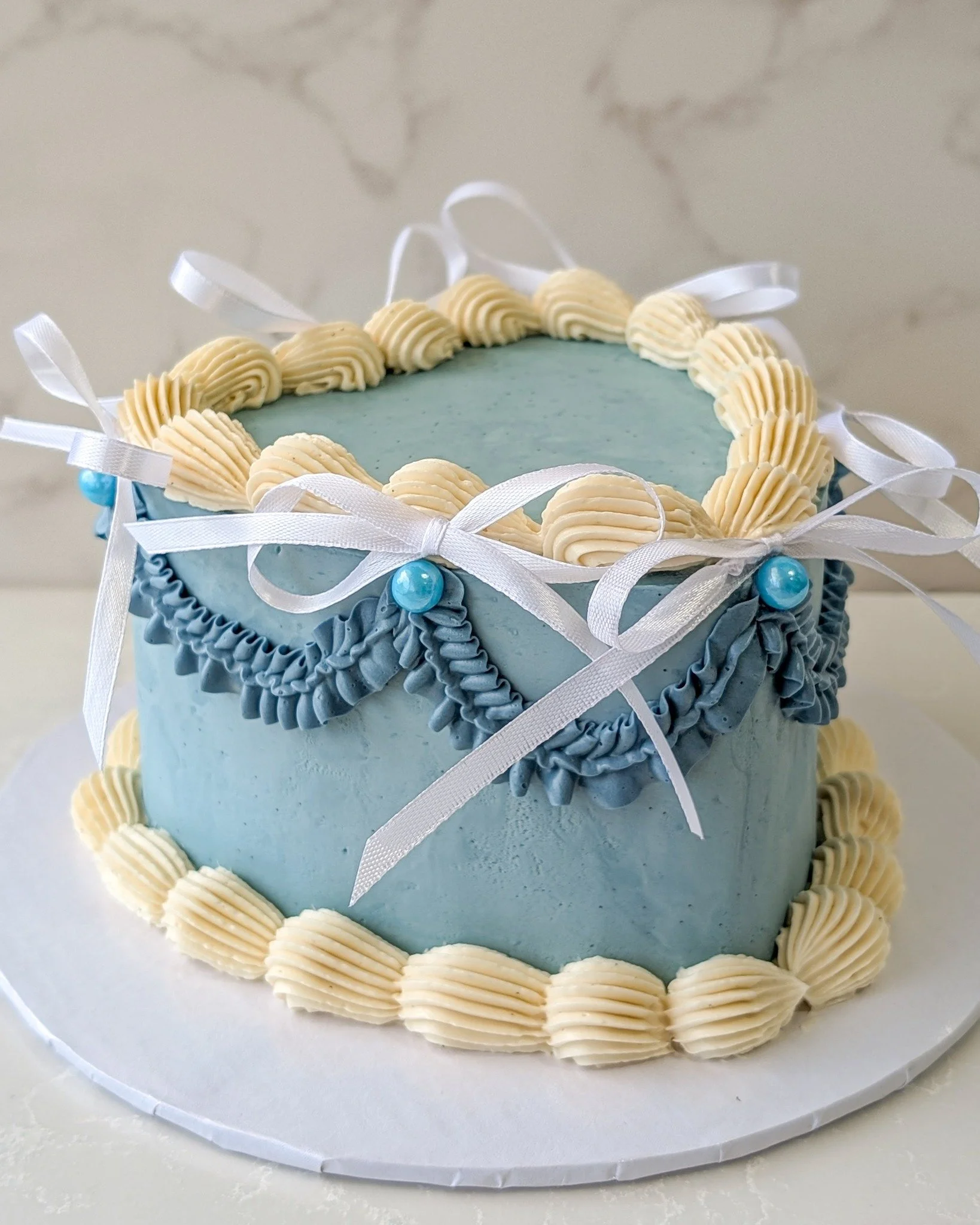I don't think vintage cakes are ever going out of style, and I'm very okay with that! 
.
Call or email us to book your orders! info@whiskandarrow.com 920-815-3645
.
Stop in or order online thru our app for pickup or delivery! Located in Appleton, Wis