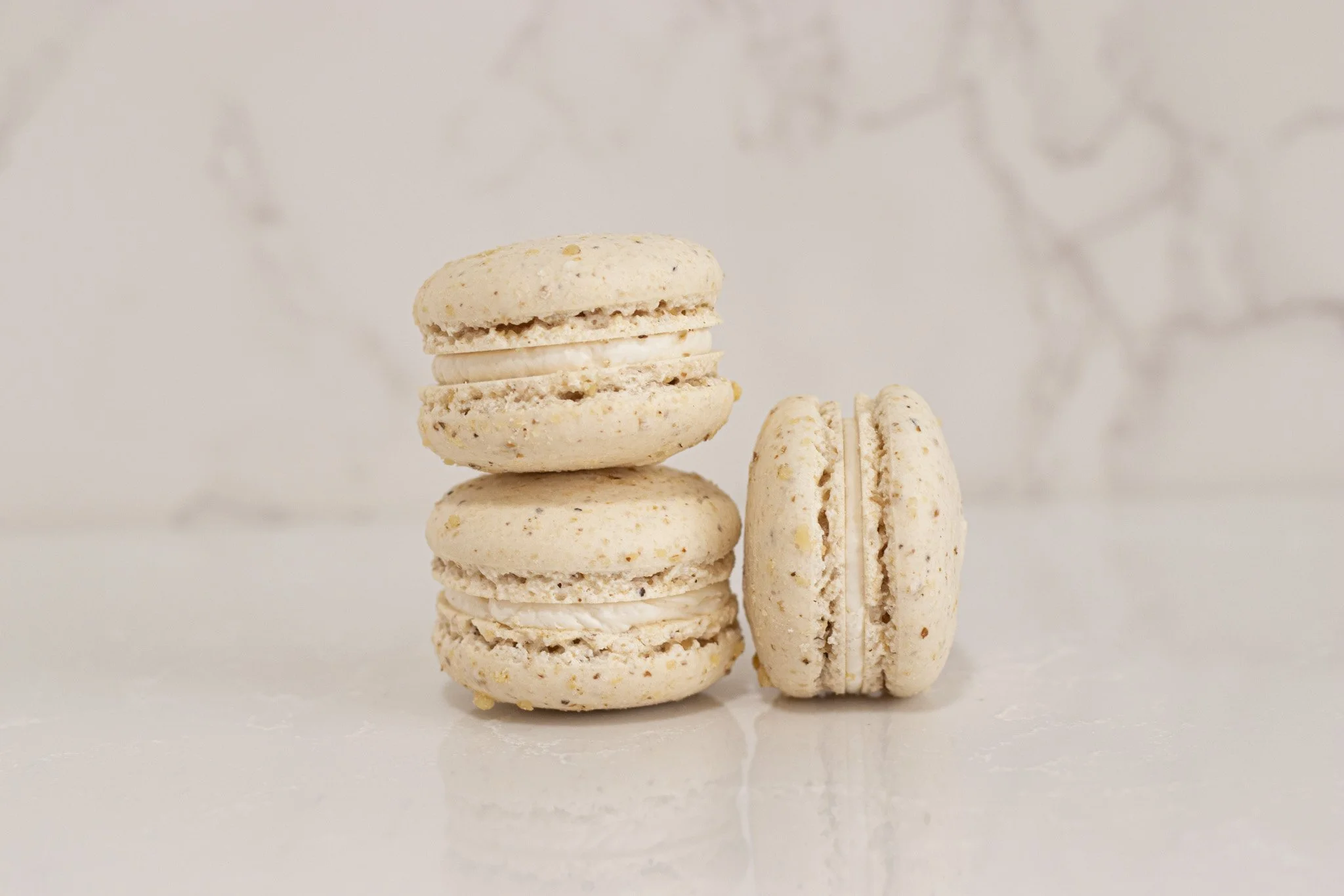 Have you tried the new Maple Walnut Macaron? This is a maple shell with crushed walnuts, and filled with maple Swiss meringue buttercream. 🍁Tag a friend who would like this macaron!
.
Stop in or order online thru our app for pickup or delivery!
.
#w