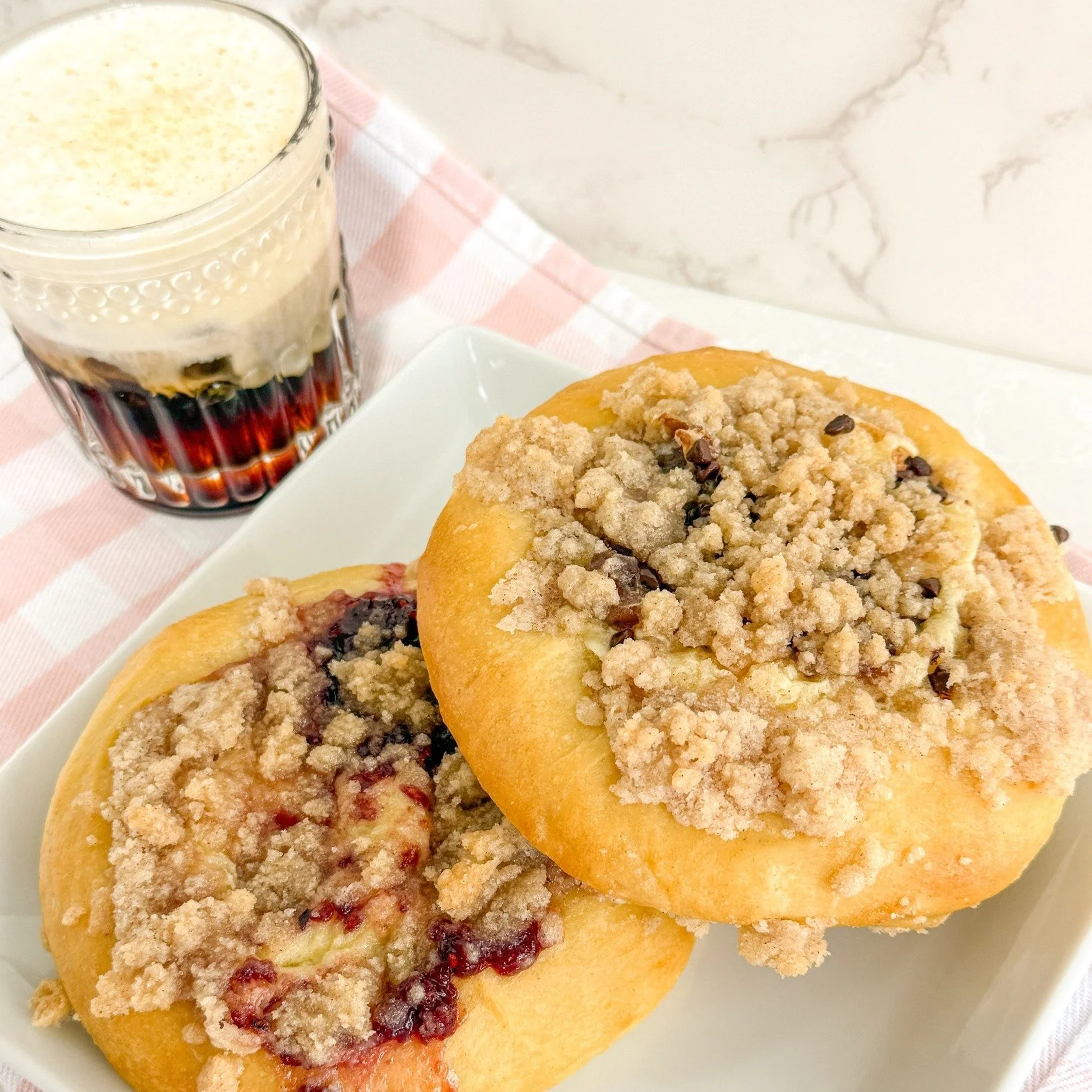 *Menu Below*
Pillowy-soft yeast buns + rich cream cheese + vibrant fruit preserves + a pinch of streusel. 😍 Today&rsquo;s batch of Kolaches are waiting for you!
Pair one (or three, we don&rsquo;t judge) with your favorite hot coffee for the absolute