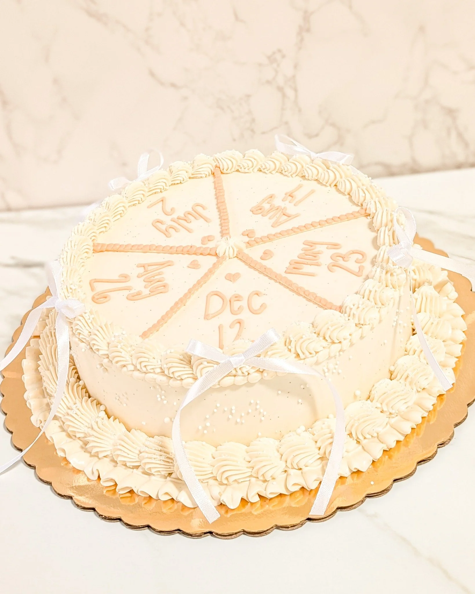 This cake just makes so much sense! If you don't live near your friends to celebrate each individual Birthday, why not do it all at once? I thought this idea was super cute, being an adult is busy, it feels like there's no time to celebrate everyone 