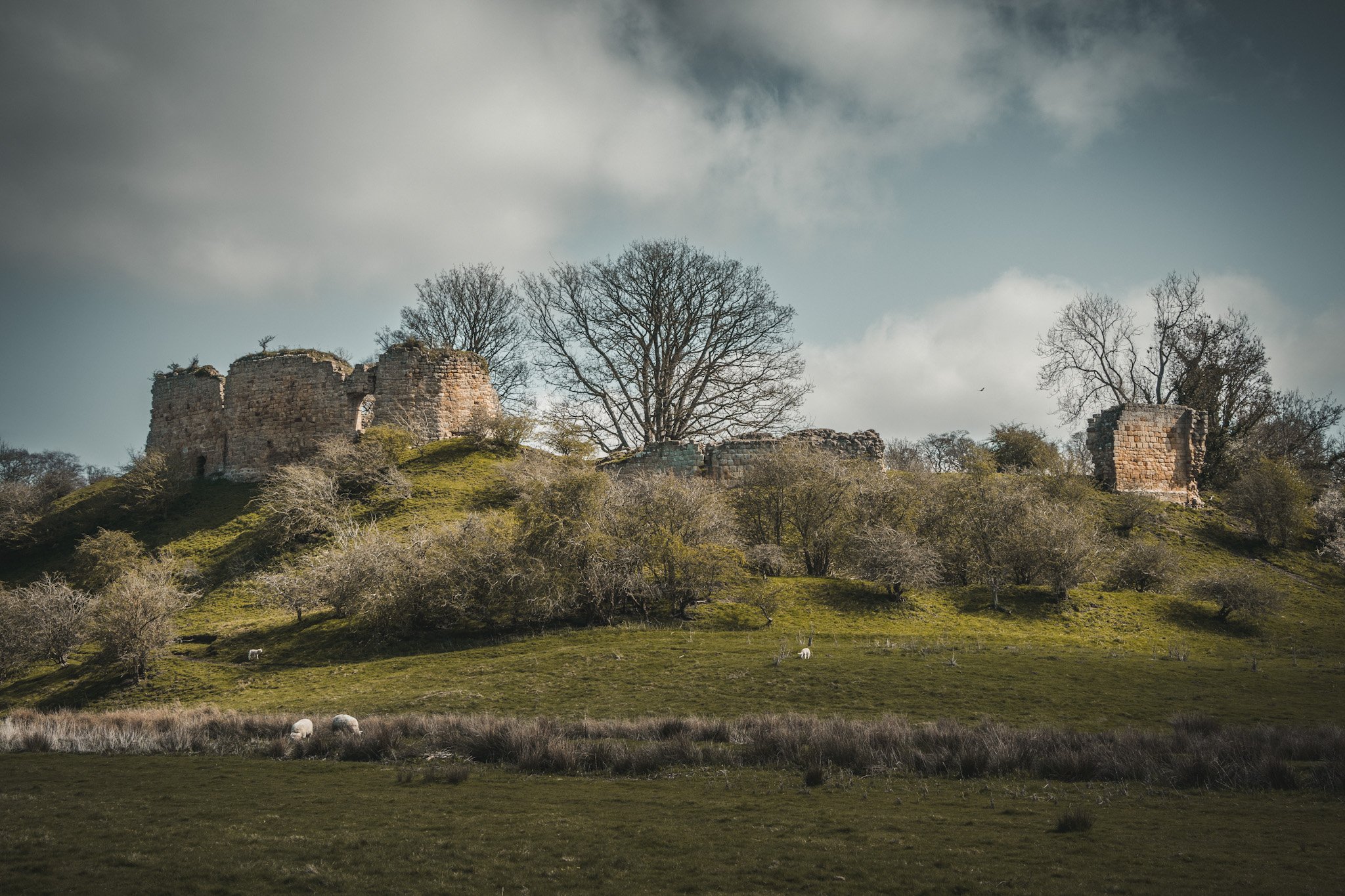 Mitford castle ruins, by Jim Scott Photography
