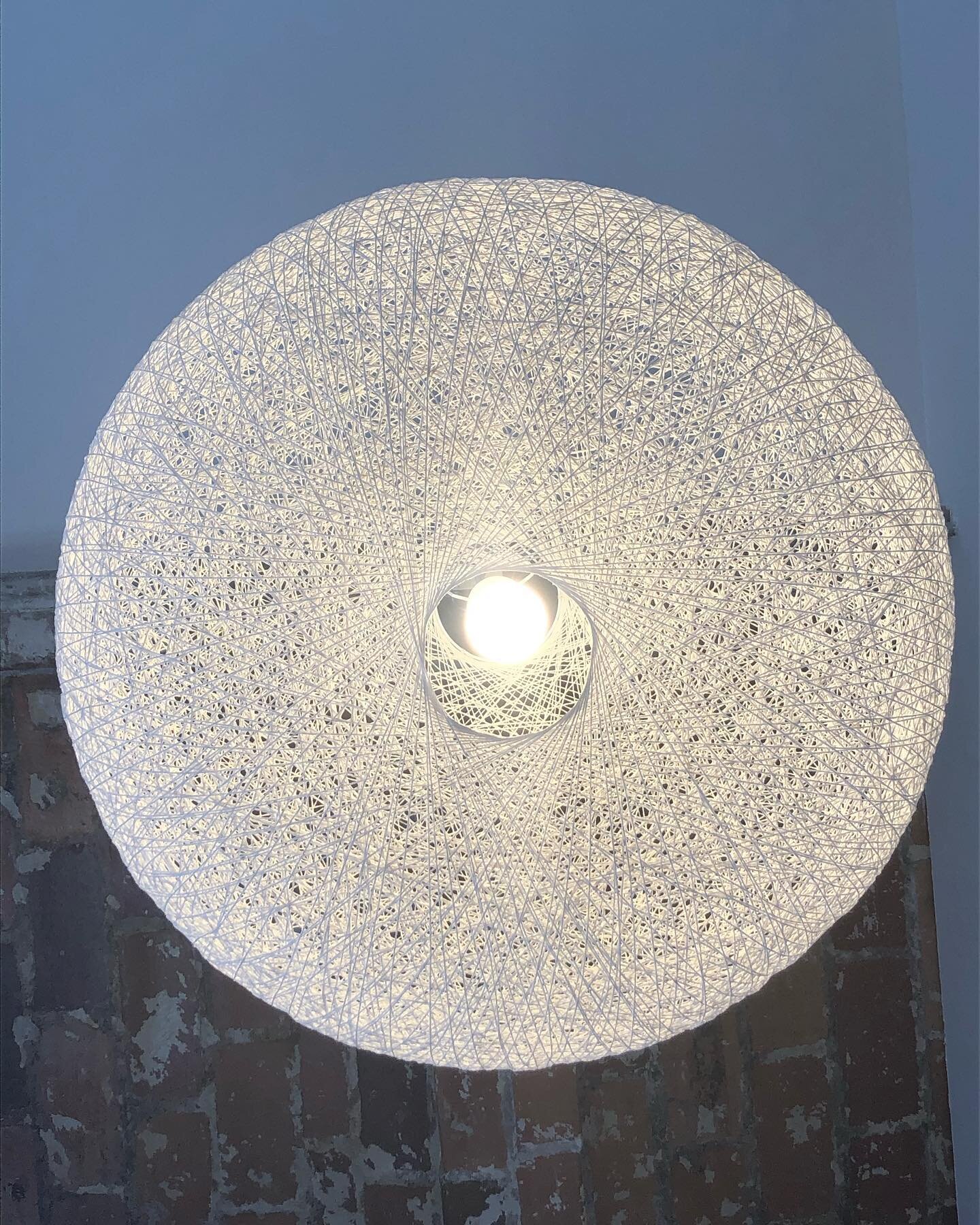 This cool light fixture is a good visualization of the fascial system in our bodies.

Fascia is internal connective tissue that wraps around organs, providing support and holding parts together. It has the appearance of a very thin spider web, connec