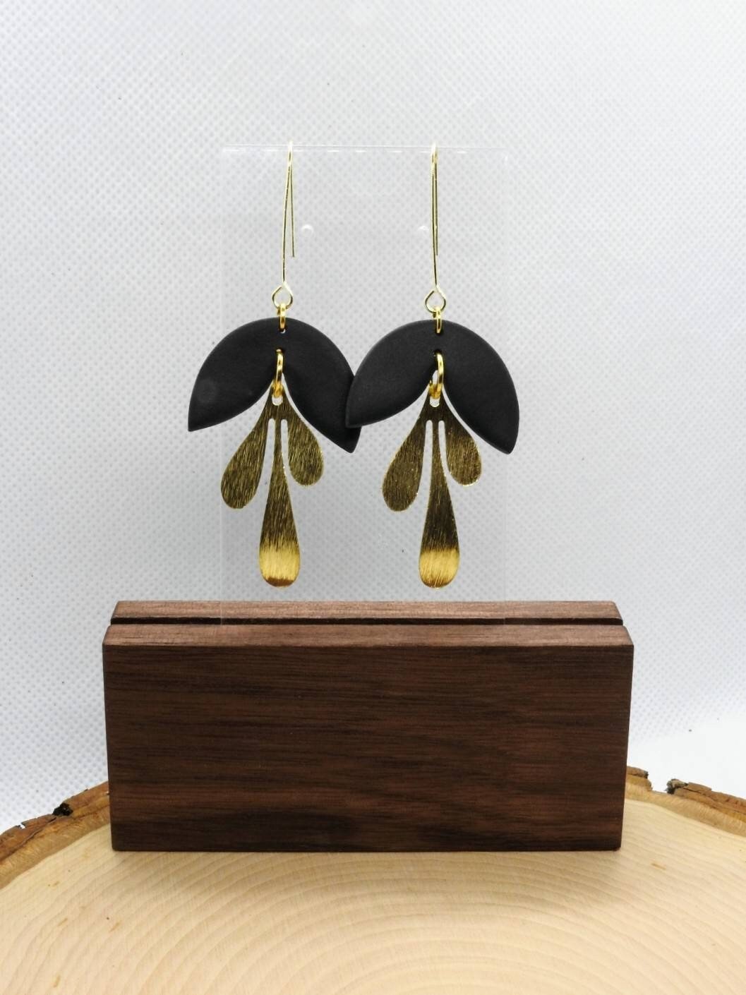 Handcrafted polymer clay earrings. Black and gold dangle earring. All components are gold plated, silver plated, or stainless steel with sensitive ears in mind.