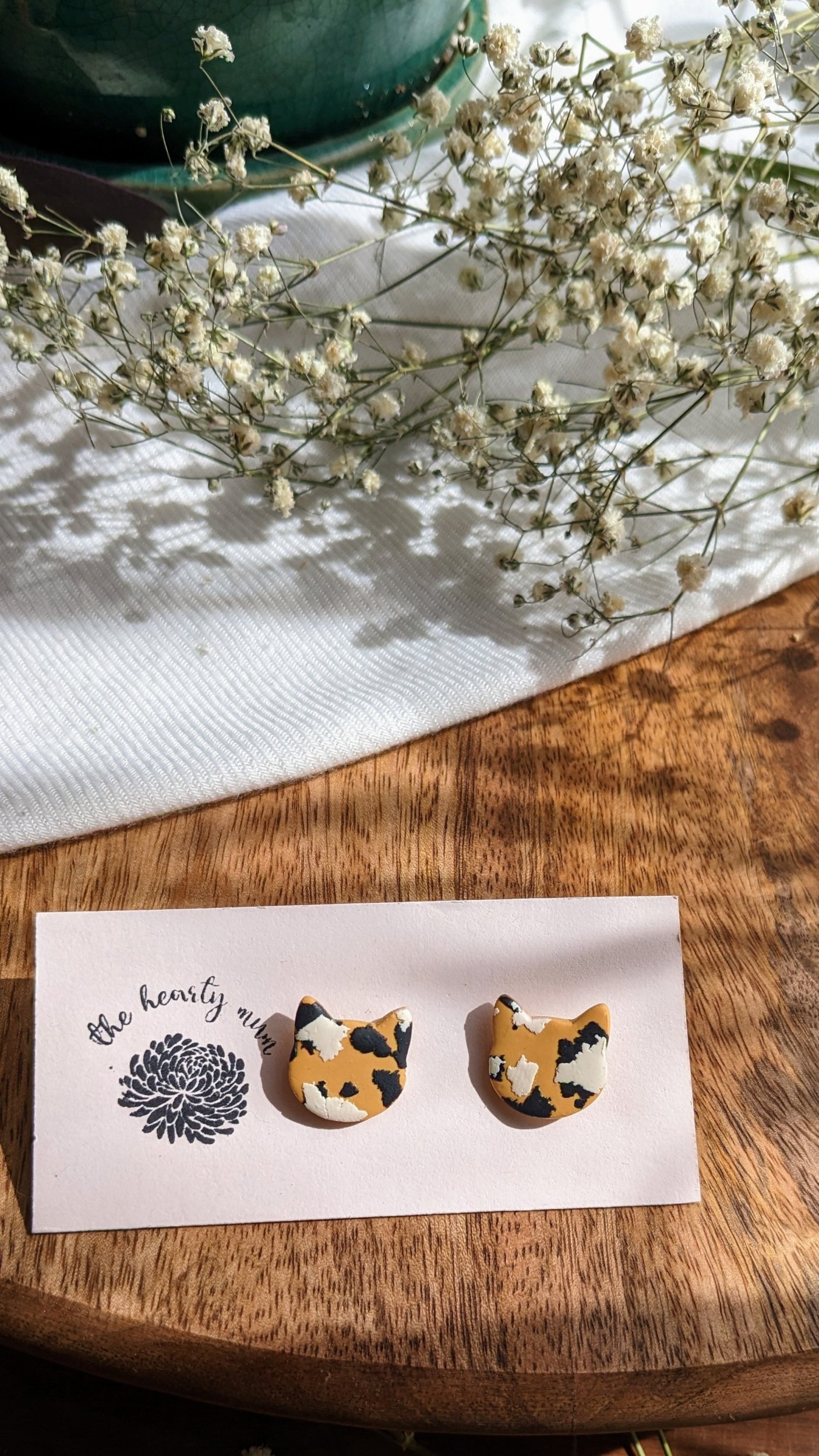 Handcrafted polymer clay earrings. Calico cat stud. All components are gold plated, silver plated, or stainless steel with sensitive ears in mind.