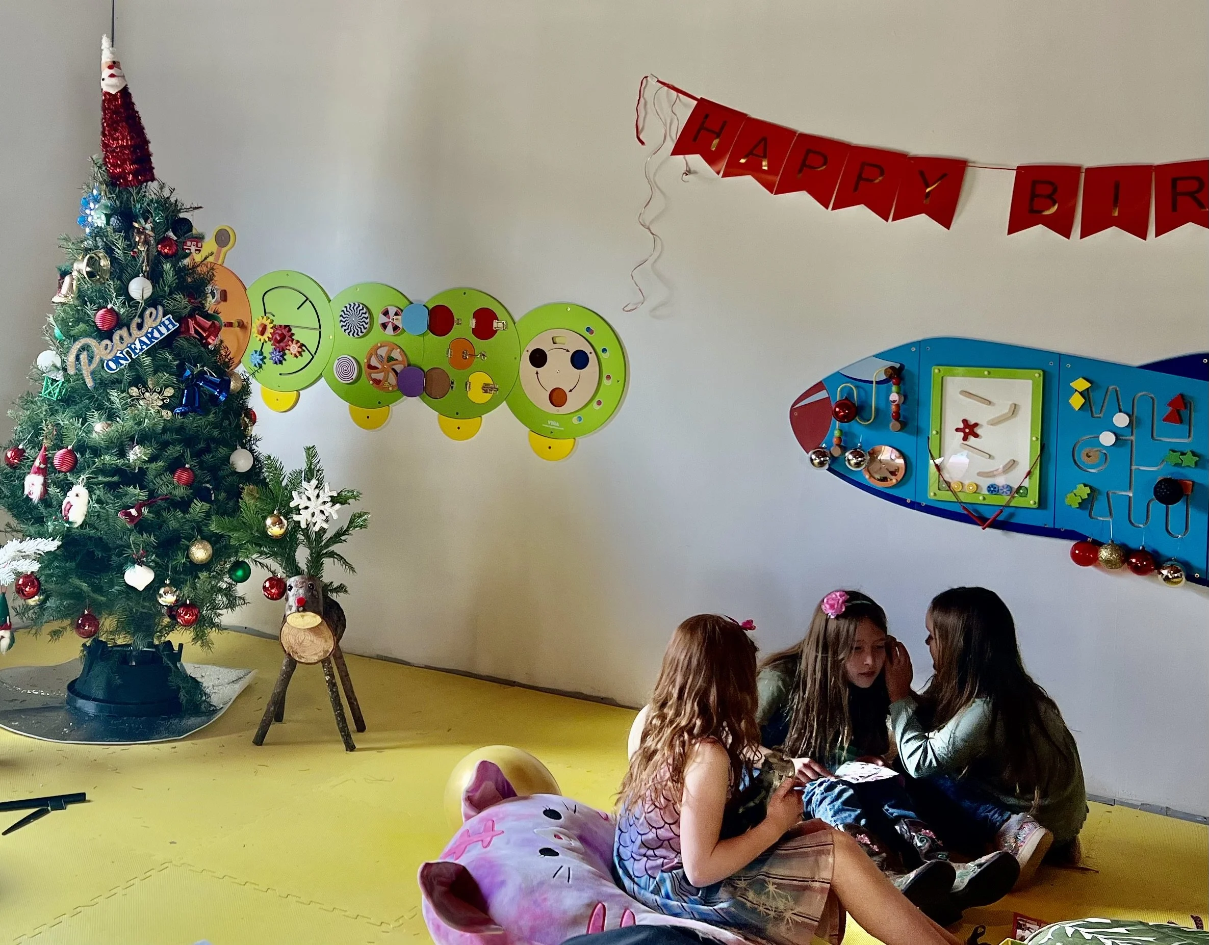 Girls just want to have fun at Christmas party in the Fun House