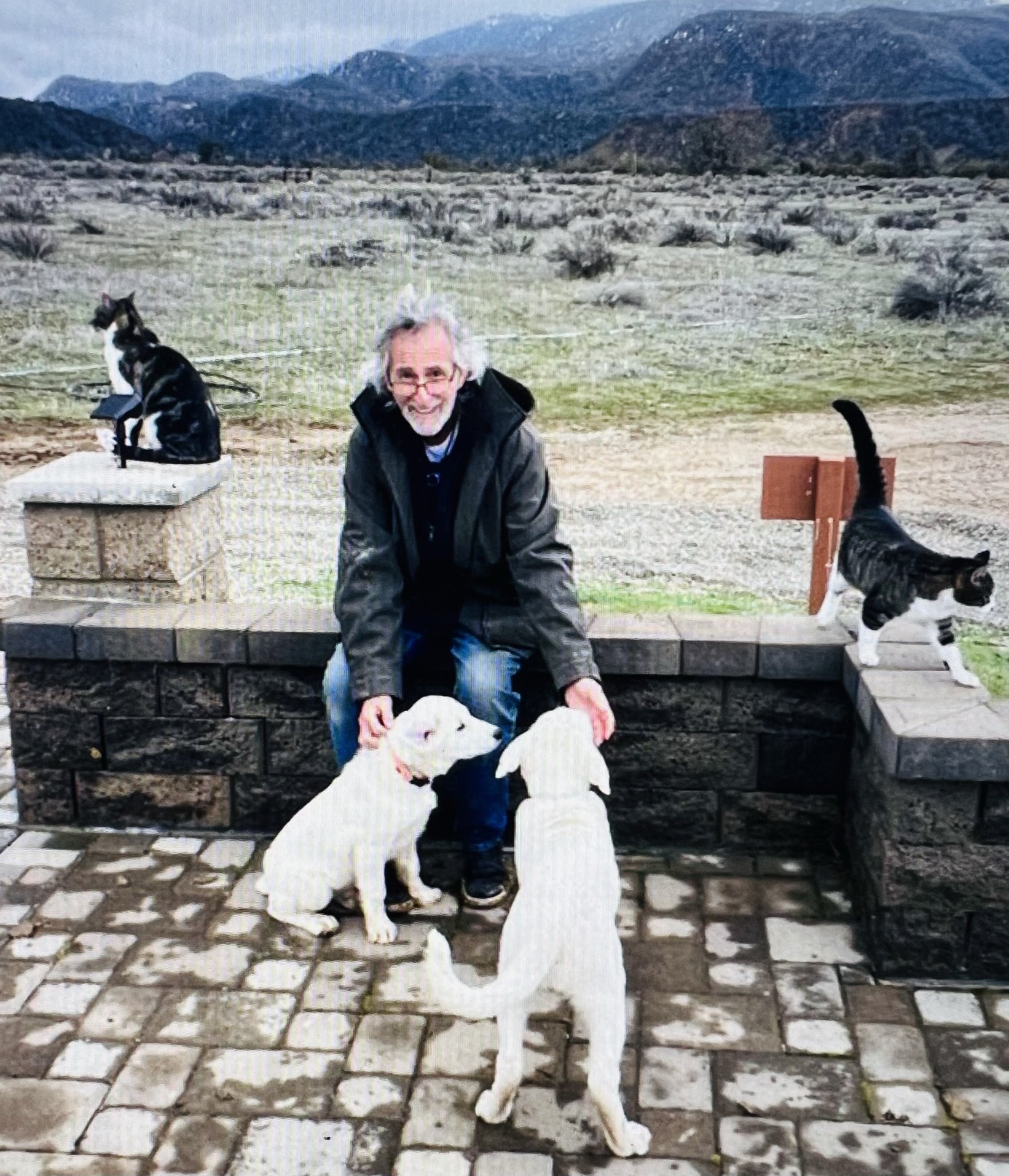 Jeff introducing Akbash puppies Happy & Lucky to Ivy & Marley at the Stupa