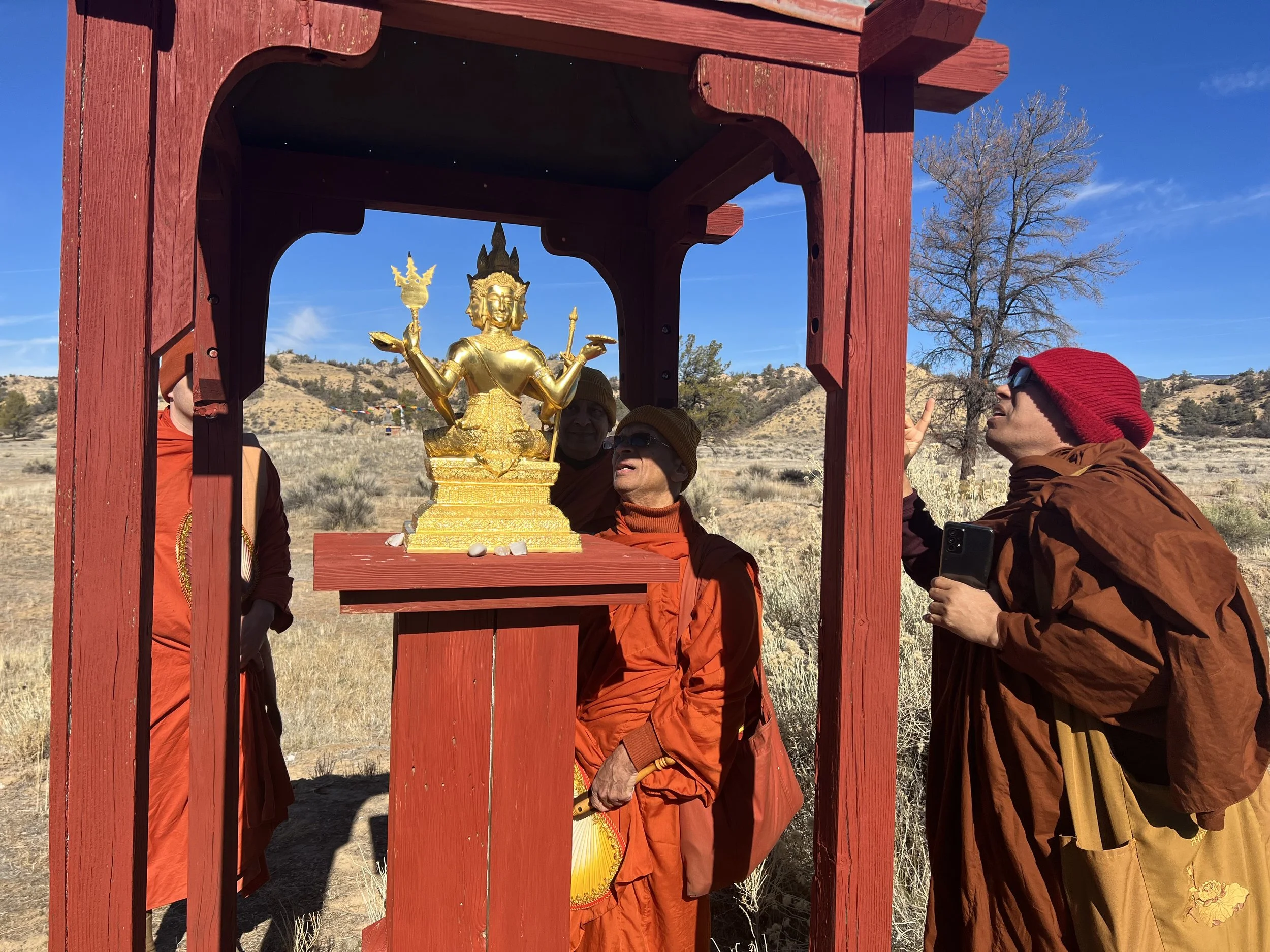 Buddhist Monks Admiring Brahma, one of the most famous religious legacies in Thailand