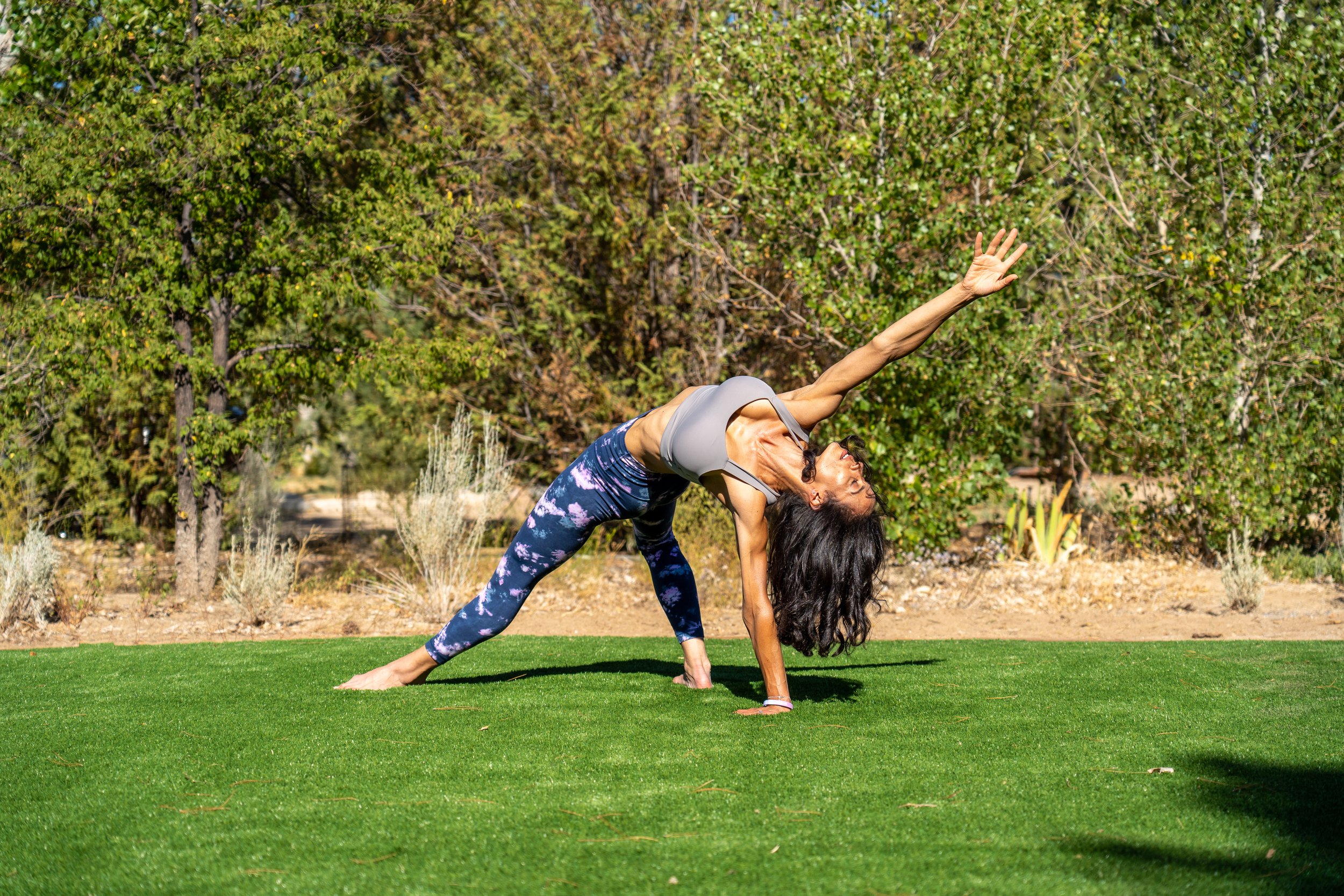 Sabrina demonstrating her flexibility as a fitness trainer, dancer & movement for trauma specialist