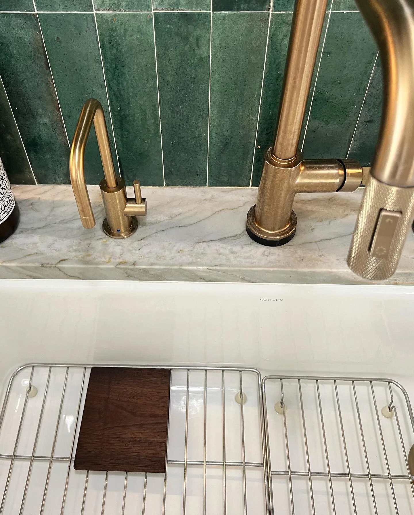Not everything is flat or aligns. 
Sometimes u spend an hour making a water bottle filling platform out of spare walnut while the baby sleeps. Thanks for the pencil @chrismann.design I used it all throughout the remodel. Finishing touches.