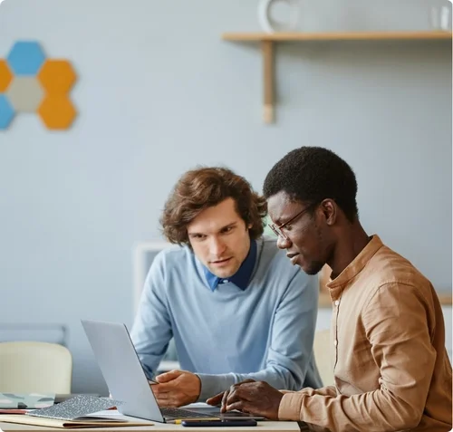 Data analytics and reporting consultants reviewing dashboards