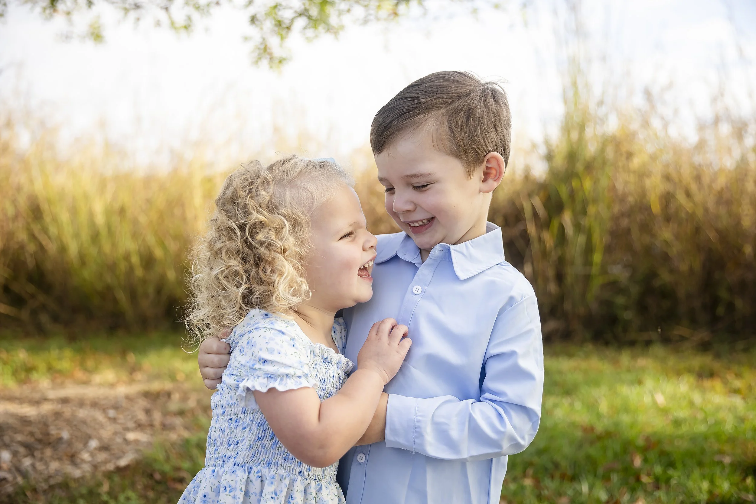 boy-and-girl-hug-family-portrait-session-Beckley-Creek-Park.JPG