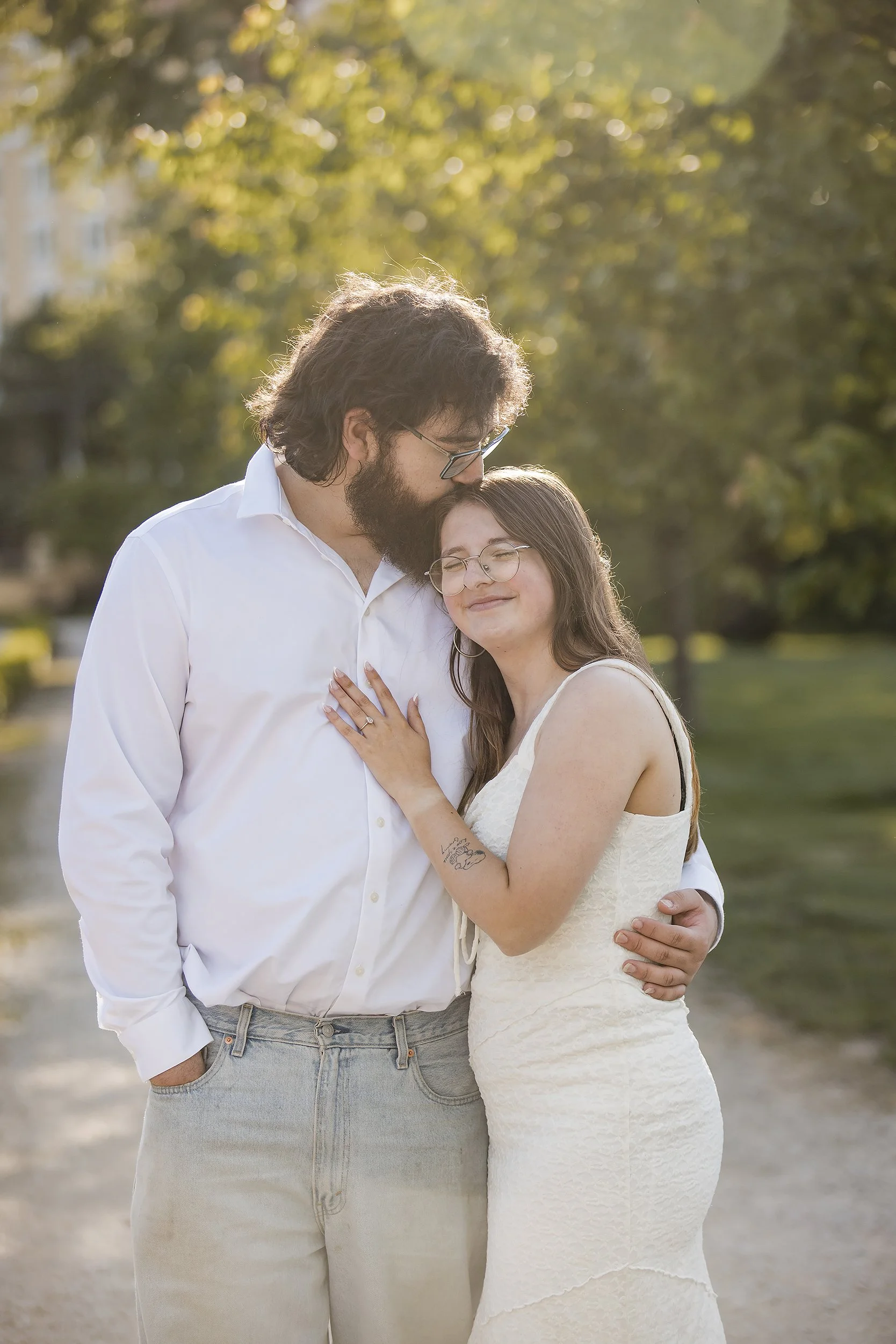 Man and Fiance Embrace West Baden.JPG