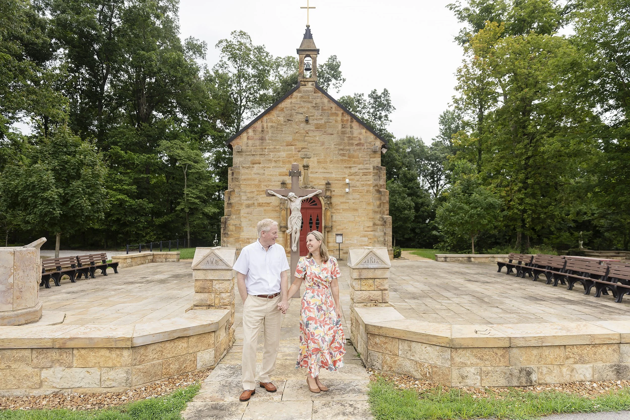 Couple walks holding hands Monte Cassino Shrine Saint Meinrad.JPG