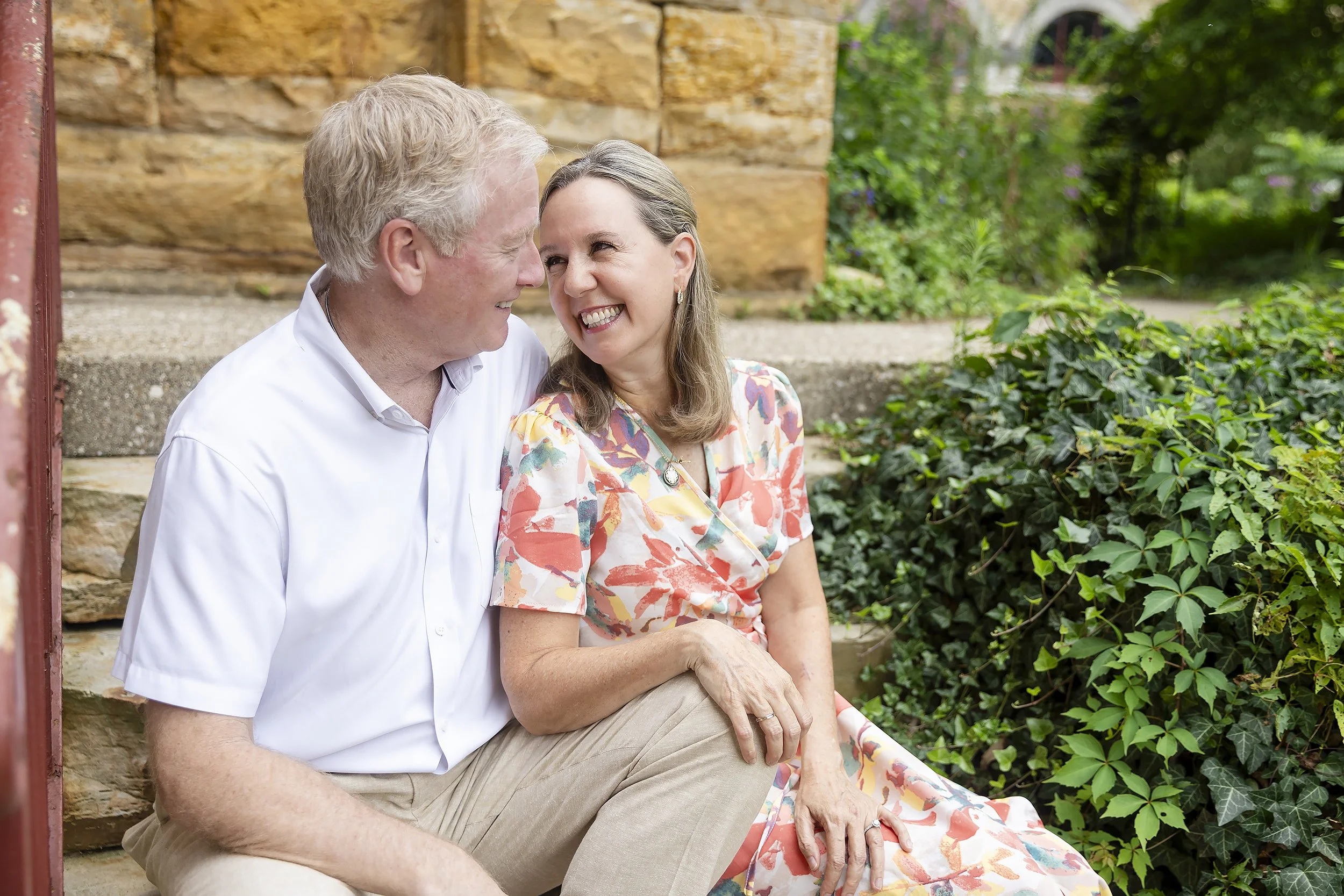 Lifestyle Engagement Couple Cuddles on Steps Saint Meinrad.JPG