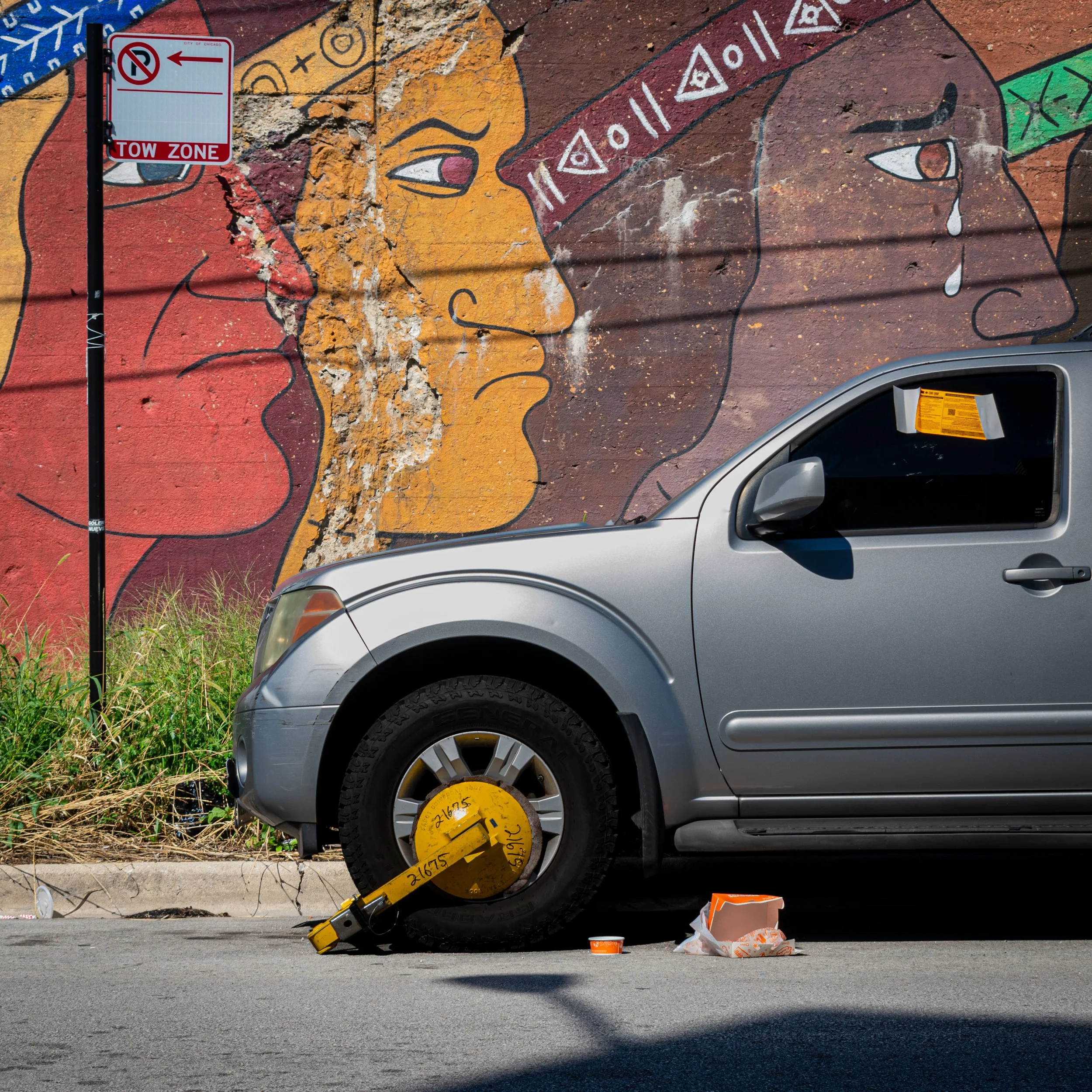 Getting booted in Pilsen, Chicago. 2023. 