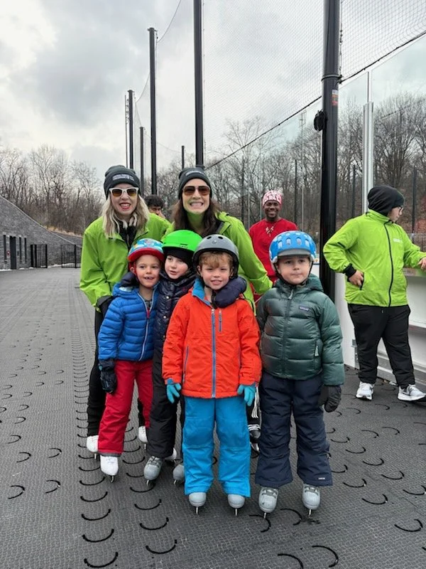 Roller Boogie teaching group ice skating lesson with kids at the Davis Center Central Park NYC