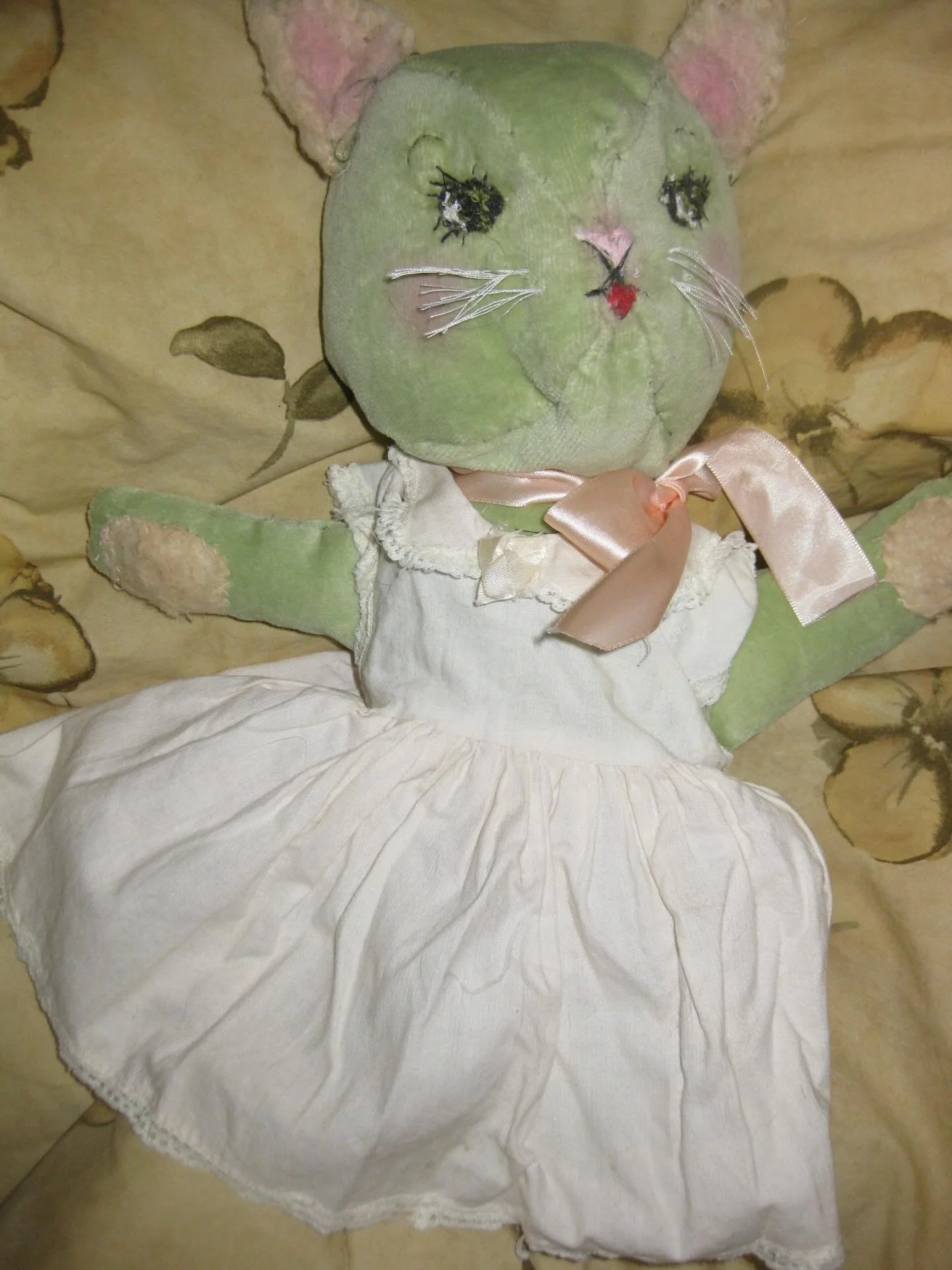 I made a strange cat stuffed animal and she is wearing a 1950s babydoll dress