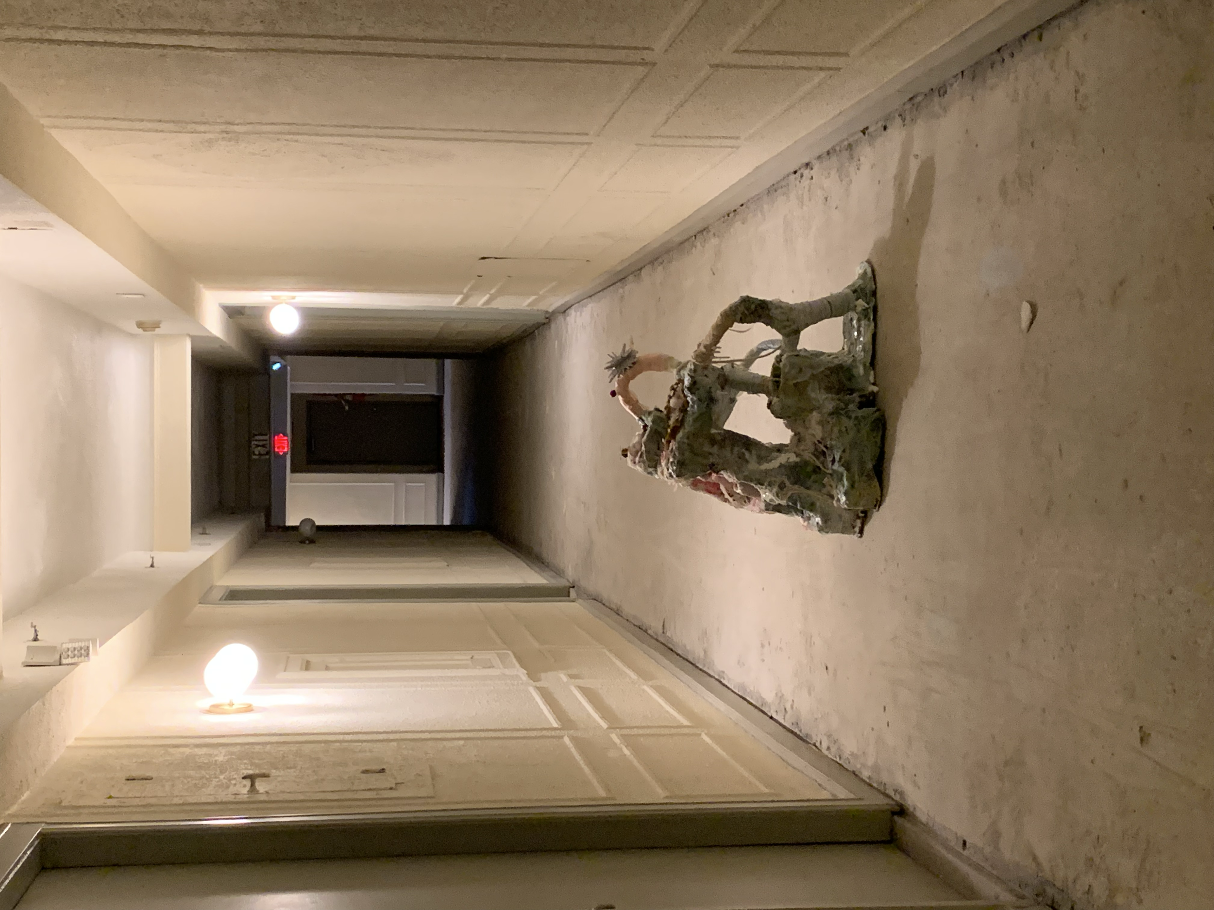 "memory" sculpture in the hallway of my old apartment building, after they ripped the carpet out