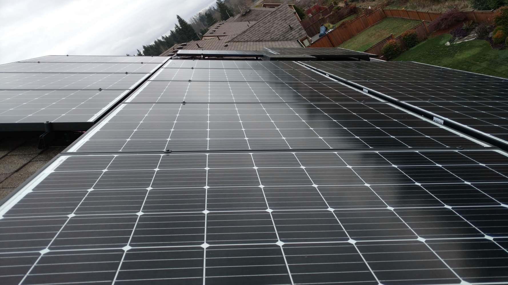 We installed 38 Itek 305 watt panels on this home facing East, South, and West. It produced 49 KWH on a single clear day in February alone. Consider the average home uses 30 KWH per day. We also installed a critical loads panel and an LG Chem Resu Li