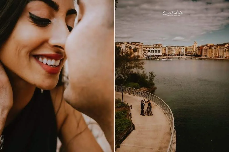 Close-up of a smiling woman with dark hair and makeup, about to kiss a man's face. On the right, a couple dressed in formal attire dancing on a curved waterfront promenade with a cityscape in the background, under a cloudy sky.